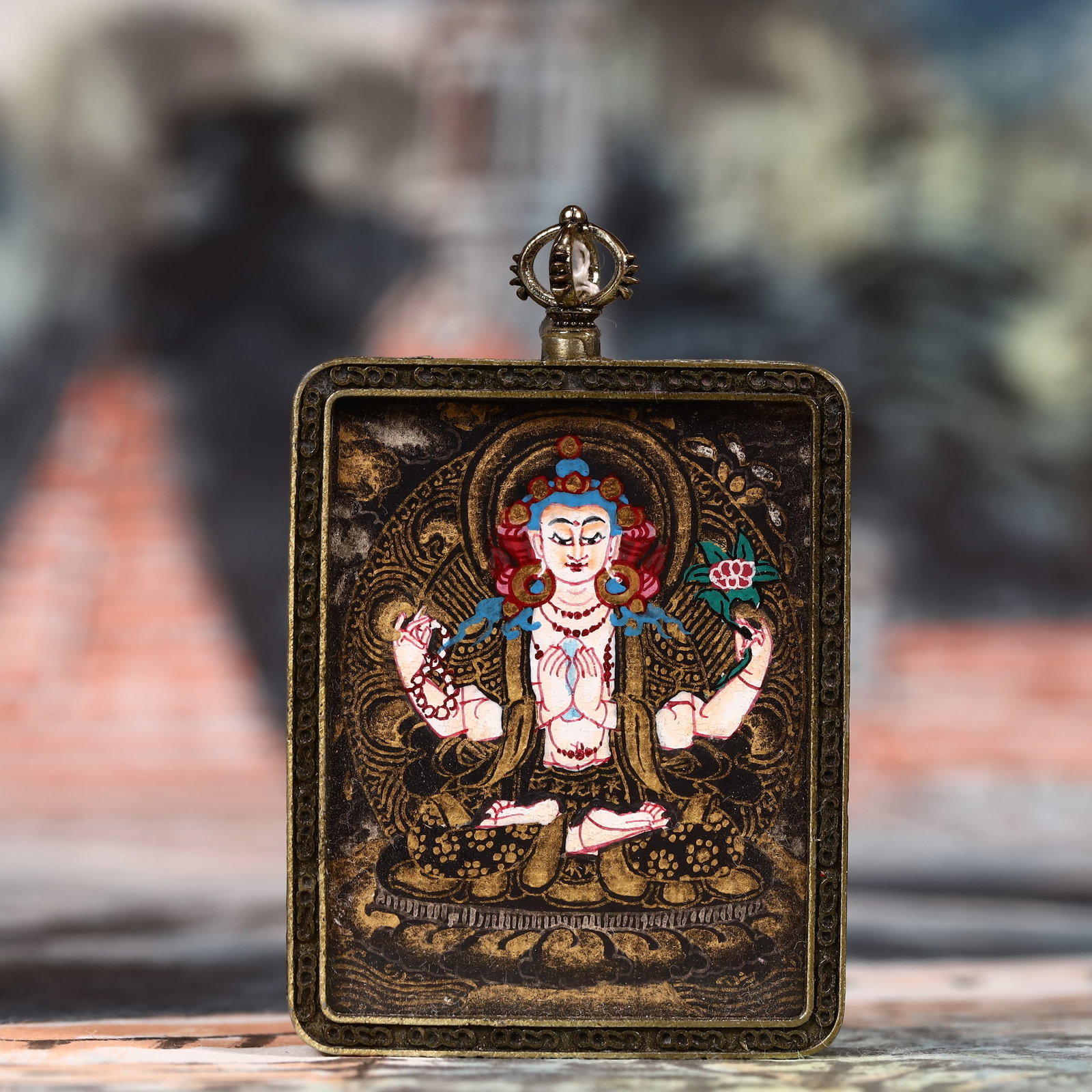 An Exquisite Painted Color Statue of Four-Armed Guanyin Tangka: An Exquisite Painted Color Statue of Four-Armed Guanyin Tangka,Size:2inx2.8in 彩绘四臂观音像唐卡