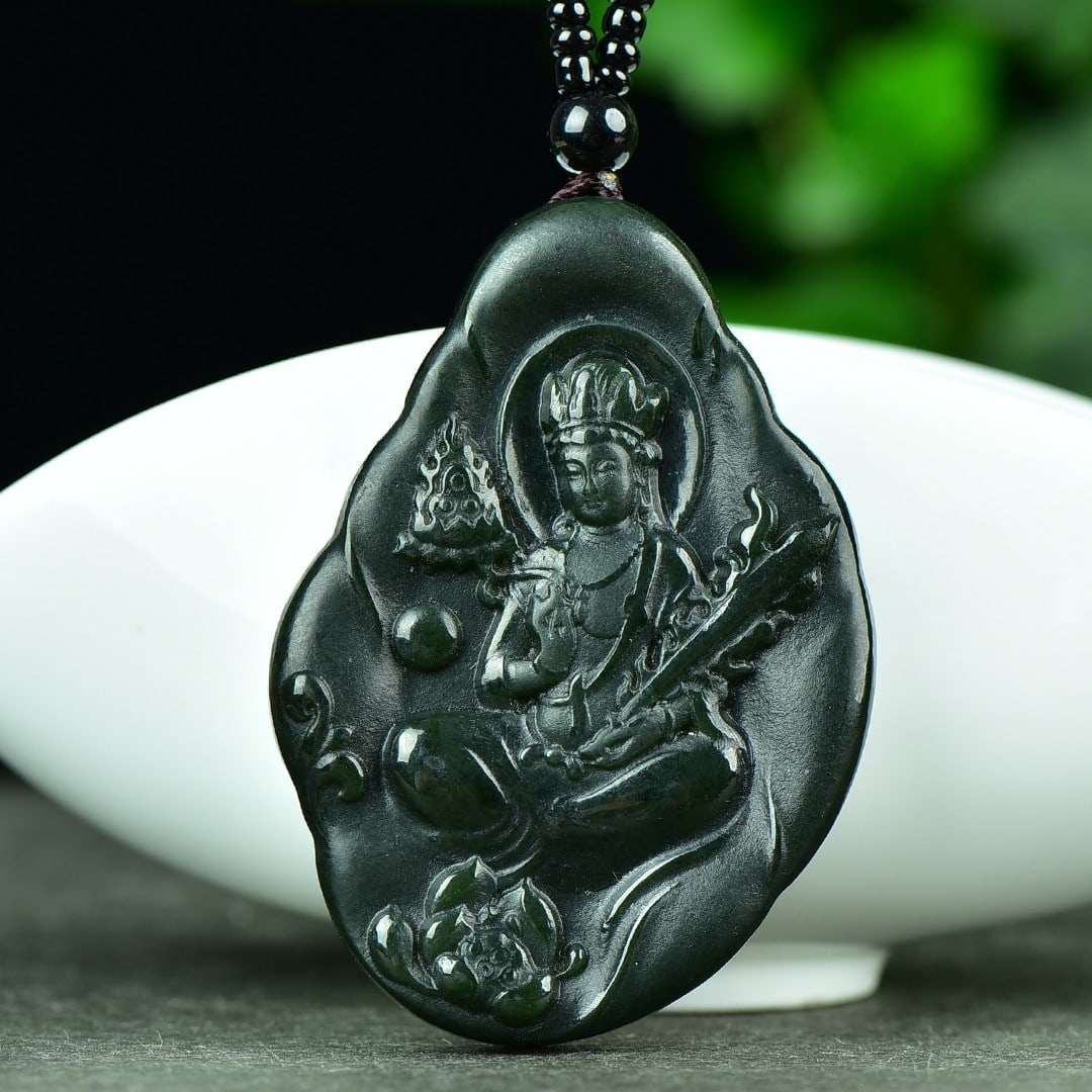 An Exquisite Sapphire Buddha Pattern Pendant: An Exquisite Sapphire Buddha Pattern Pendant,Size:1.6inx2.4in 寓意:吉祥 普度众生 保平安 青玉佛像纹ࡧ