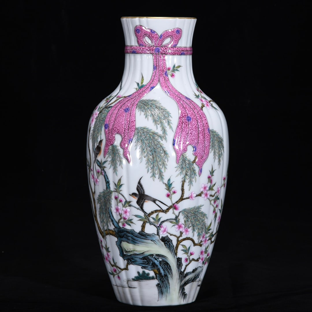 An Exquisite Famille-Rose Flower and Bird Pattern Vase: An Exquisite Famille-Rose Flower and Bird Pattern Vase Qing Dynasty, China Qianlong Six-character Mark Size:12.8inx6.3in粉彩花鸟纹瓜棱瓶 中国