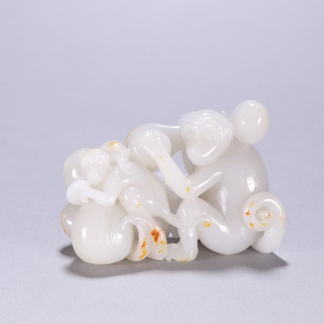 An Exquisite White Jade Monkey Ornament: An Exquisite White Jade Monkey Ornament Qing Dynasty, China Size:2.6inx3.5in Weight:253.3g白玉子母猴摆件 中国清代 Size:6.5cmx8.8cm