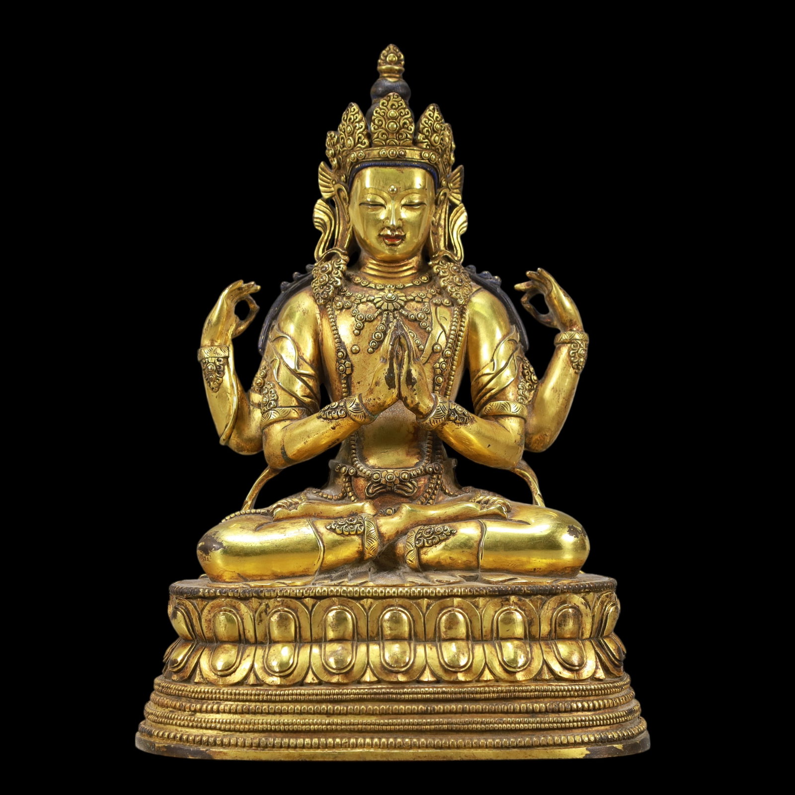 A Exquisite Gilt Bronze Four-arms Statue of Avalokitesvara: A Exquisite Gilt Bronze Four-arms Statue of Avalokitesvara Ming Dynasty, China Size:7.9inx3.9inx7.1in Weight:4150g铜鎏金四臂观音