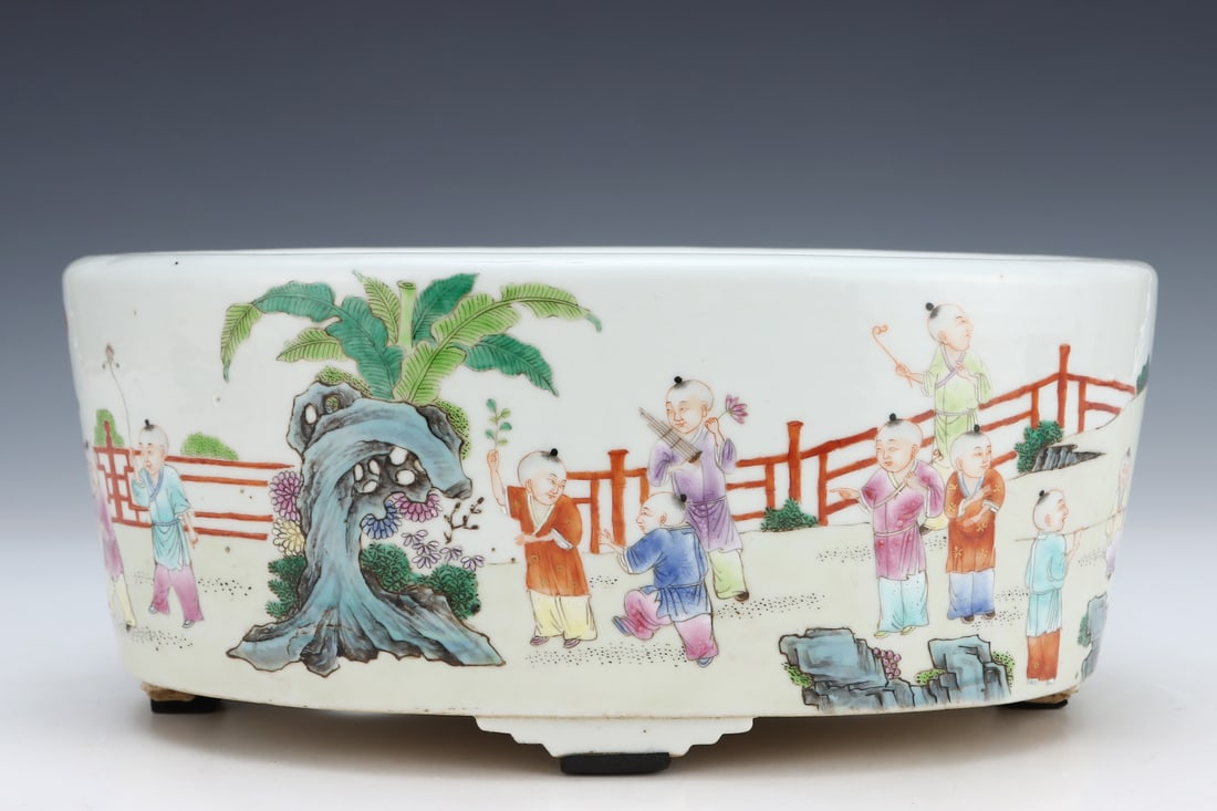 An Exquisite Famille-Rose Character and Story Pattern Basin: An Exquisite Famille-Rose Character and Story Pattern Basin Qing Dynasty, China Size:4.5inx10.9in粉彩婴戏图纹花盆 中国清代 Size: