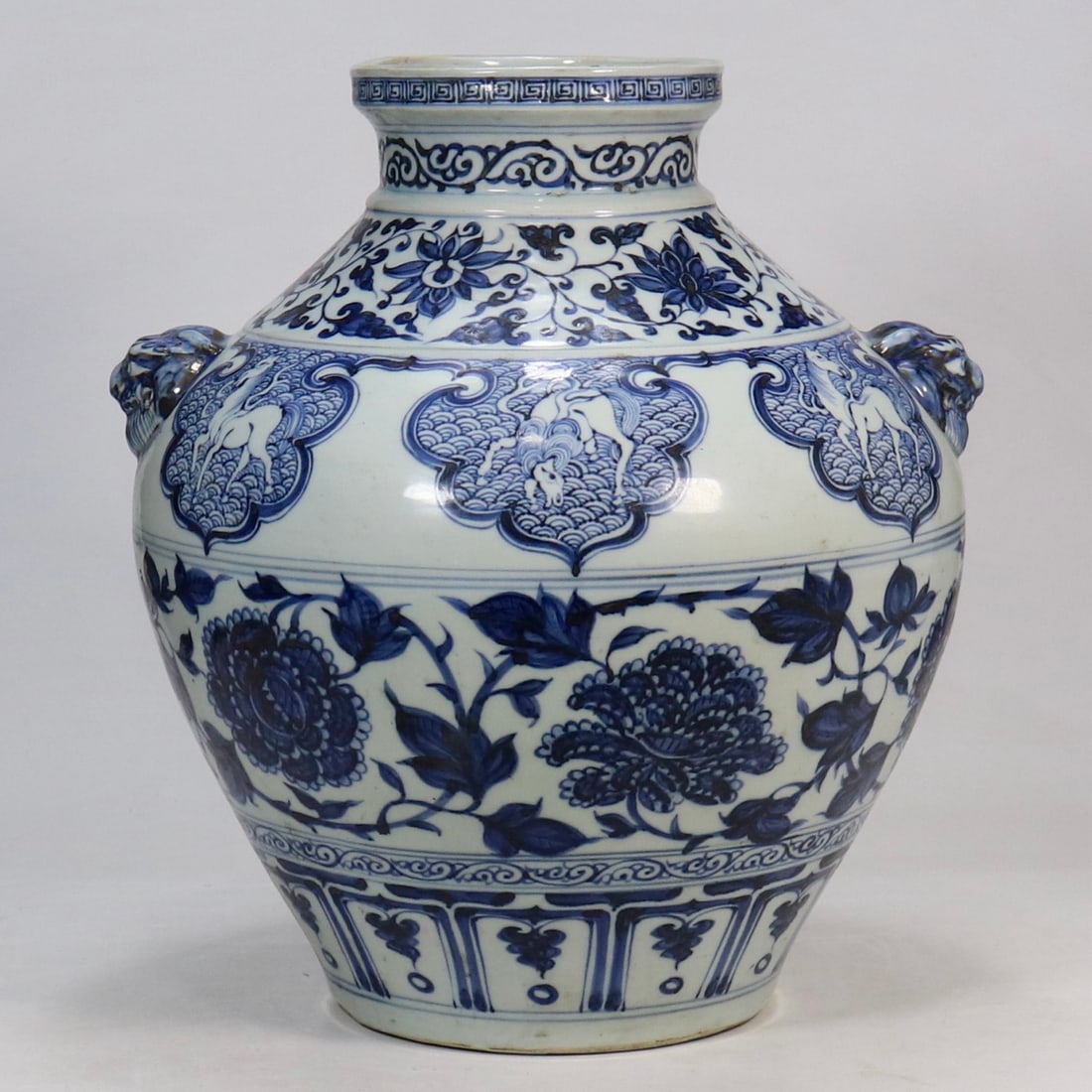 An Exquisite Blue and White Lotus Pattern Double-Ears Jar: An Exquisite Blue and White Lotus Pattern Double-Ears Jar Yuan Dynasty, China Size:15inx5.7in青花缠枝牡丹“海马”图兽耳Ņ