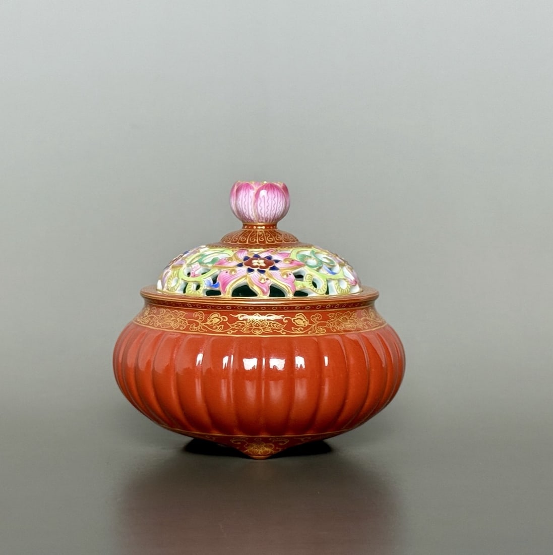 An Exquisite Iron-Red Painted Gold Flower Pattern Tripod Censer: An Exquisite Iron-Red Painted Gold Flower Pattern Tripod Censer Qing Dynasty, China Qianlong Four-character Mark