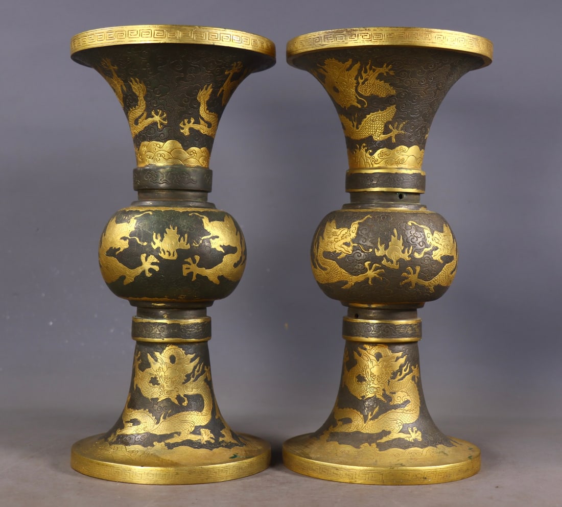 A Pair of Exquisite Gilt Bronze Dragon Pattern Ornament: A Pair of Exquisite Gilt Bronze Dragon Pattern Ornament Tang Dynasty, China Zhenguan Four-character Mark Size: 15inx5.3in
