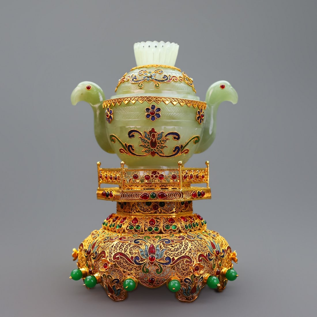 An Exquisite Gilt Bronze Inlaid White Jade Lotus Pattern Double-Ears Censer Ornament: An Exquisite Gilt Bronze Inlaid White Jade Lotus Pattern Double-Ears Censer Ornament Qing Dynasty, China Qianlong Four-character Mark Size:7.9inx5.1in Weight:535g铜鎏金白஍
