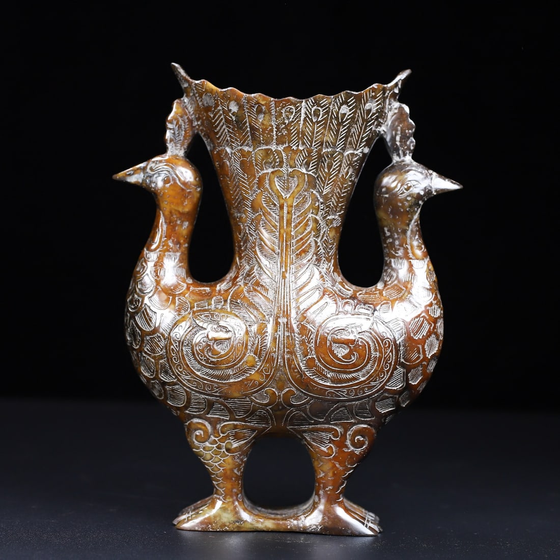 An Exquisite White Jade Phoenix-Shaped Cup: An Exquisite White Jade Phoenix-Shaped Cup Han Dynasty, China Size:6.5inx5.4inx2in Weight:1.03kg白玉双凤杯 中国汉代 Size:16.5cmx13.6cmx5.2cm Weigh
