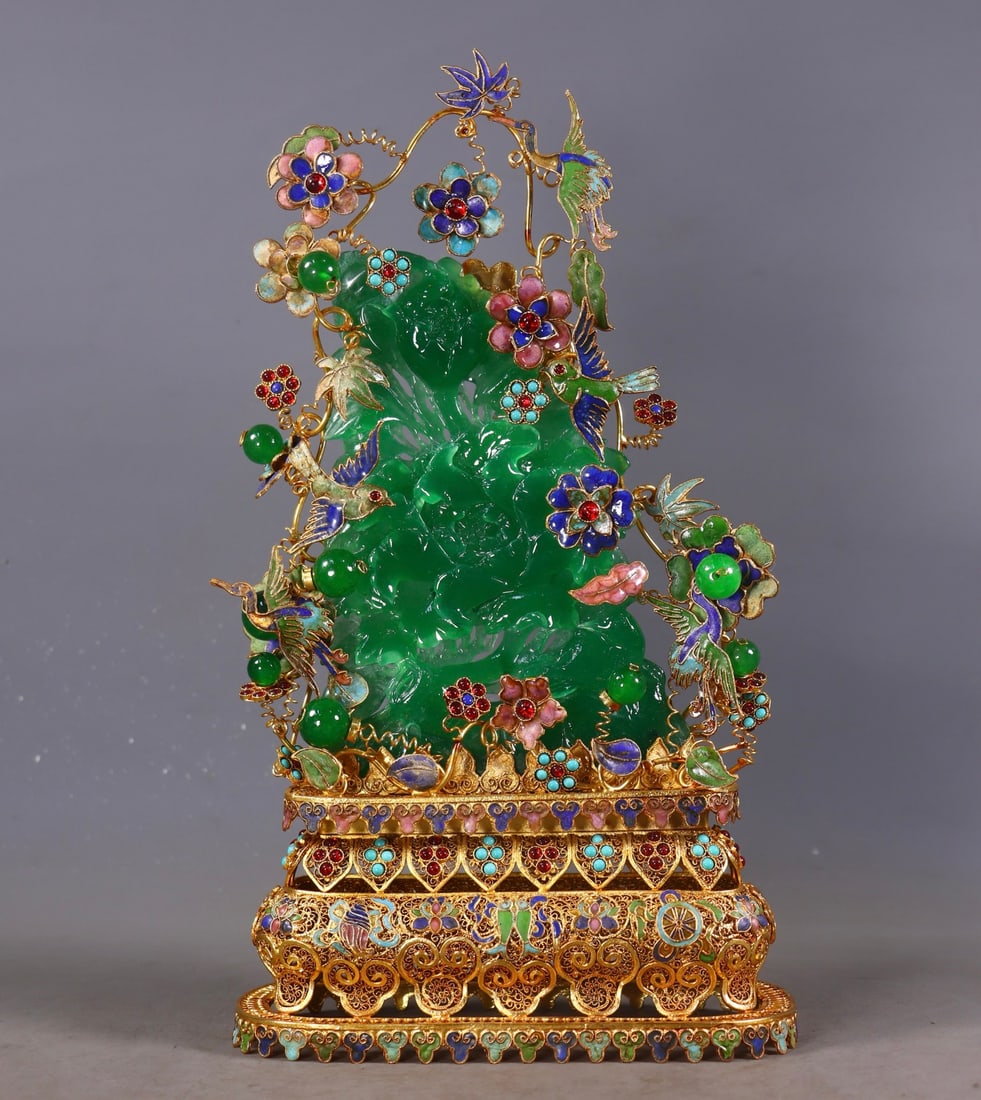 An Exquisite Gilt Bronze Inlaid Jadeite Rockery Ornament: An Exquisite Gilt Bronze Inlaid Jadeite Rockery Ornament Qing Dynasty, China Qianlong Four-character Mark Size: 13inx7.3inx3.1in