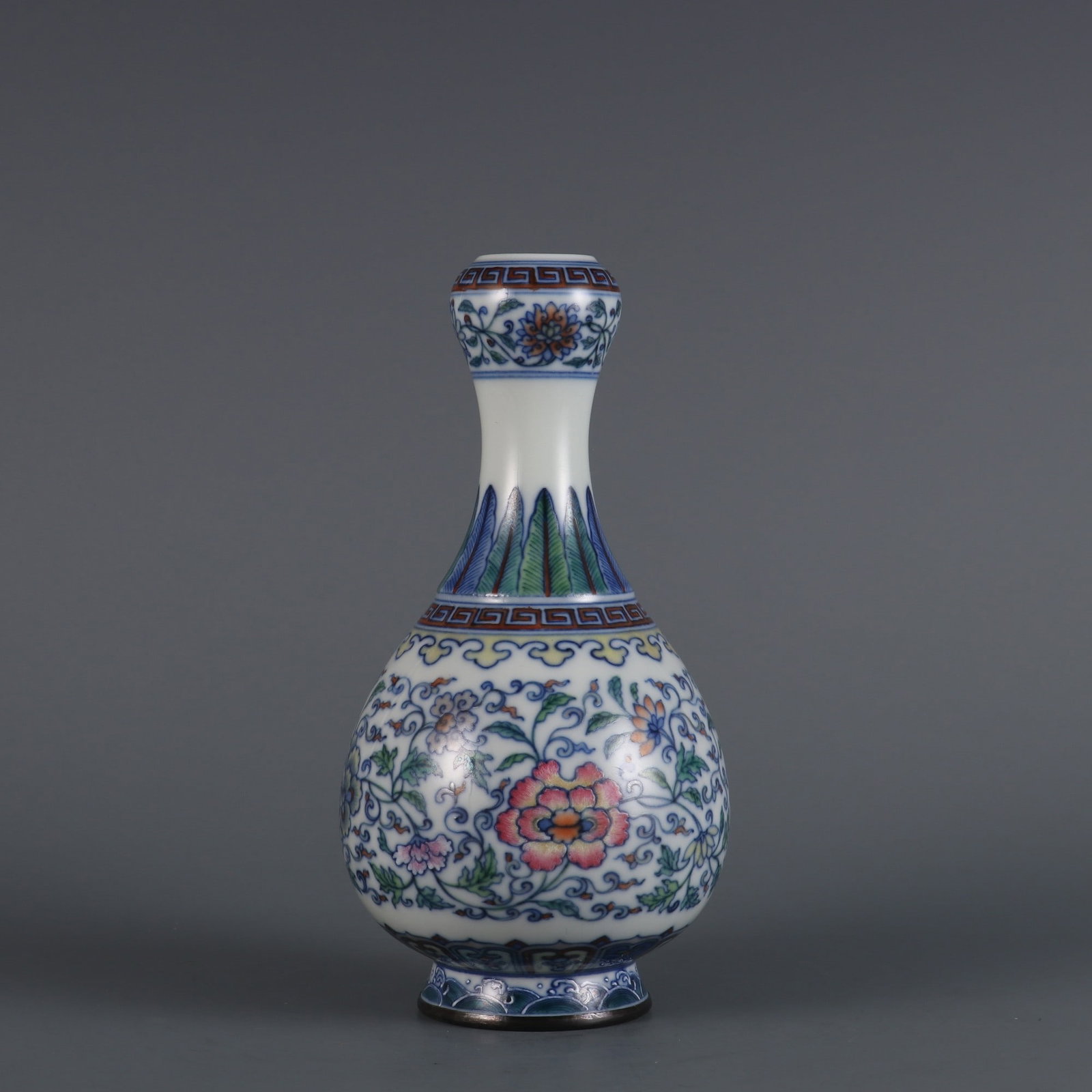 An Exquisite Doucai Lotus Pattern Vase: An Exquisite Doucai Lotus Pattern Vase Qing Dynasty, China Qianlong Six-character Mark Size:7.5inx3.7in斗彩缠枝莲纹蒜头瓶 中国清