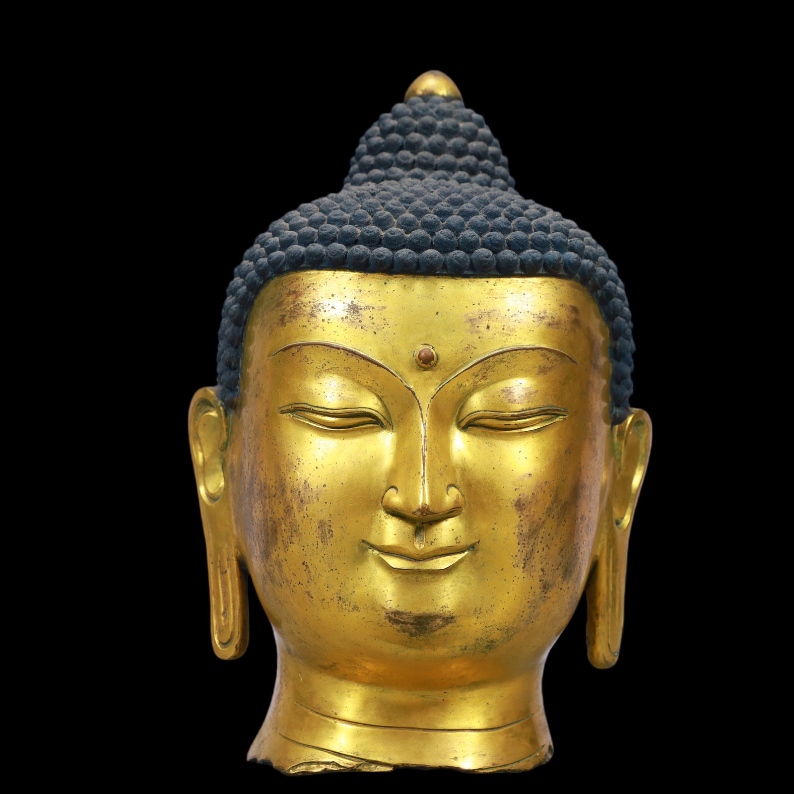 An Exquisite Gilt Bronze Buddha head (1 of 7)