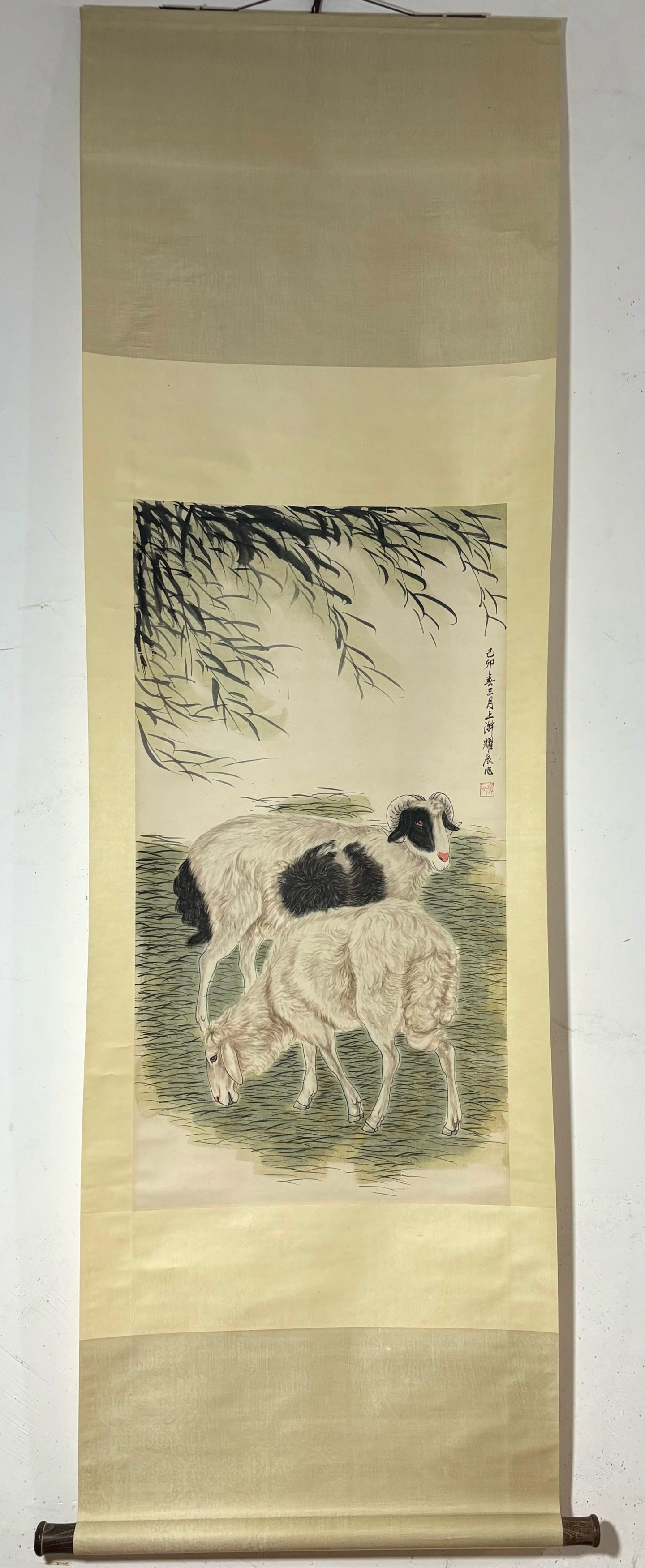 A Chinese Vertical Scroll Ink Painting of Sheep on Paper: A Chinese Vertical Scroll Ink Painting of Sheep on Paper Liu kuiling Without frame Size:33.5inx17.9in刘奎龄双羊图 纸本立轴Without frame
