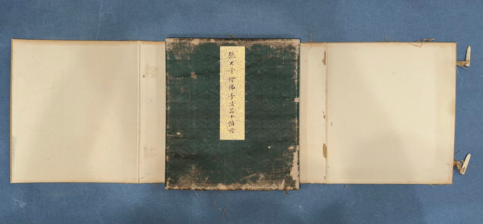 A Chinese Album Ink Painting of Buddha's hand on Paper: A Chinese Album Ink Painting of Buddha's hand on Paper Zhang daqian Size:8.3inx9.4inx10张大千绘佛手法器十帧 纸本画册