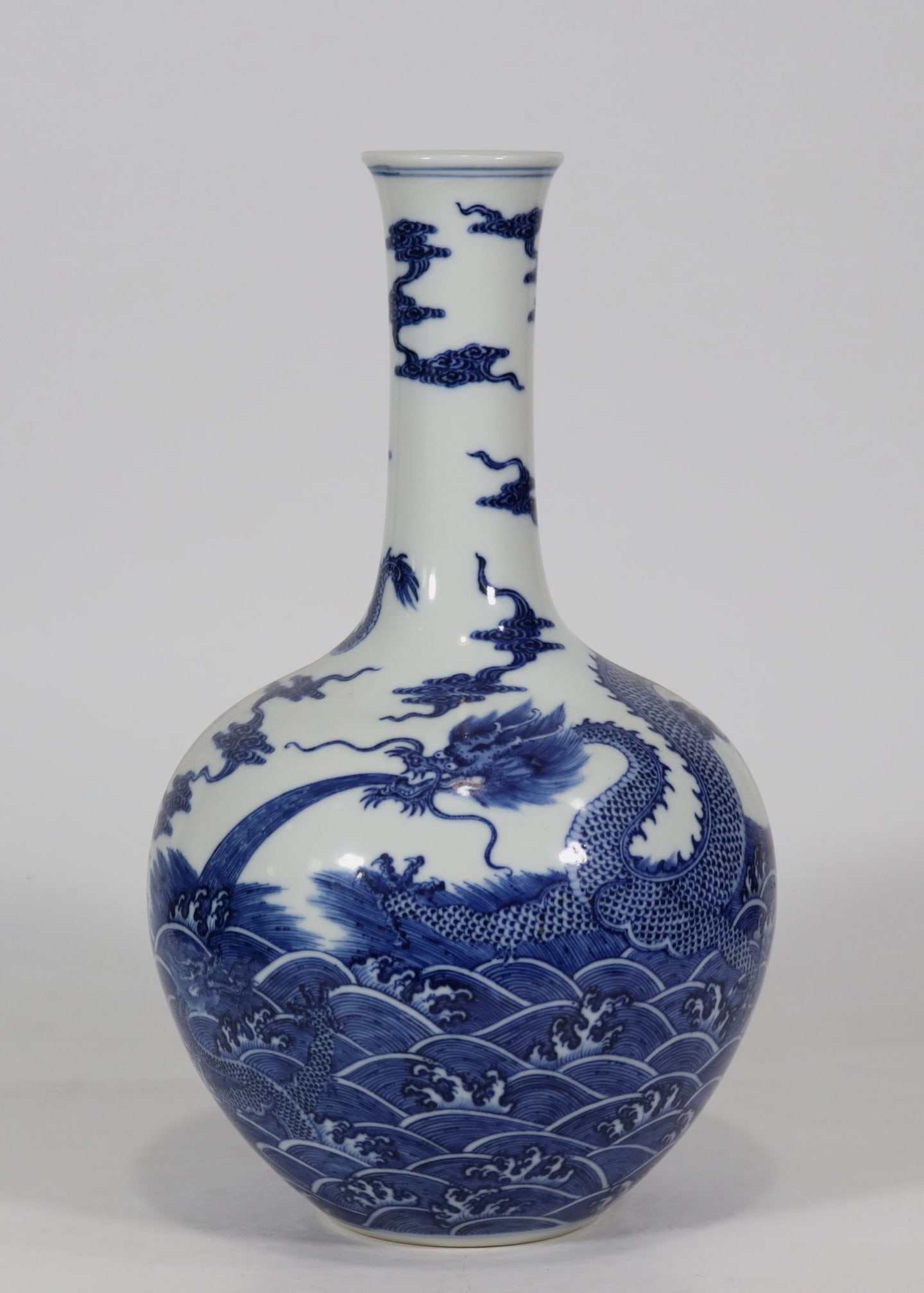 An Exquisite Blue and White Dragon Pattern Seawater Pattern Vase: An Exquisite Blue and White Dragon Pattern Seawater Pattern Vase Qing Dynasty, China Qianlong Six-character Mark