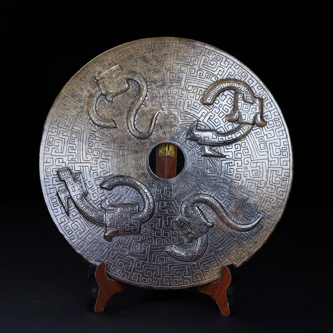 An Exquisite White Jade Ornament: An Exquisite White Jade Ornament Han Dynasty, China Diameter Size:8.2inx0.1in Weight:491.5g白玉玉璧 中国汉代 Diameter Size:20.9cmx0.3cm Weight:491.5g