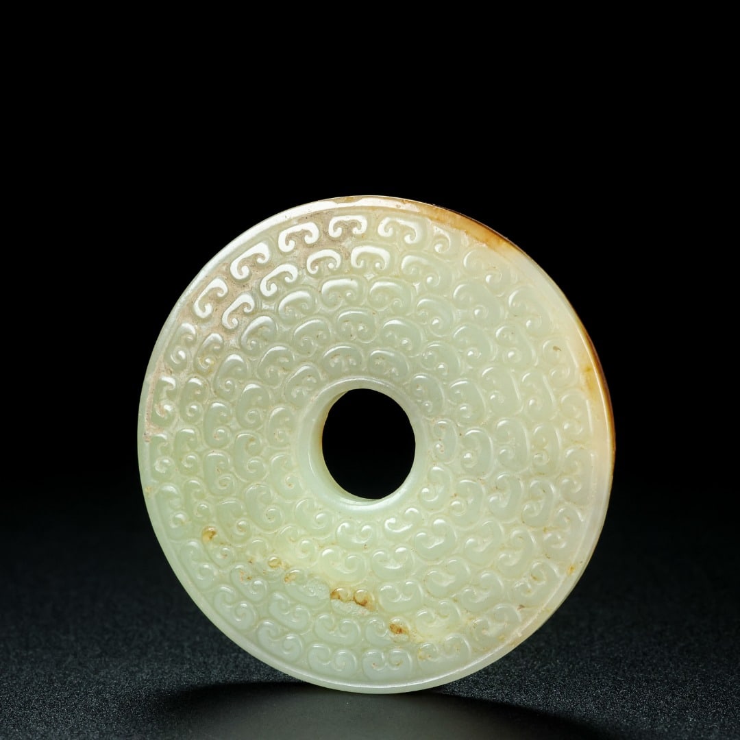An Exquisite White Jade Pendant: An Exquisite White Jade Pendant Han Dynasty, China Diameter Size:2.3inx0.2in Weight:44.9g白玉璧 中国汉代 Diameter Size:5.9cmx0.5cm Weight:44.9g