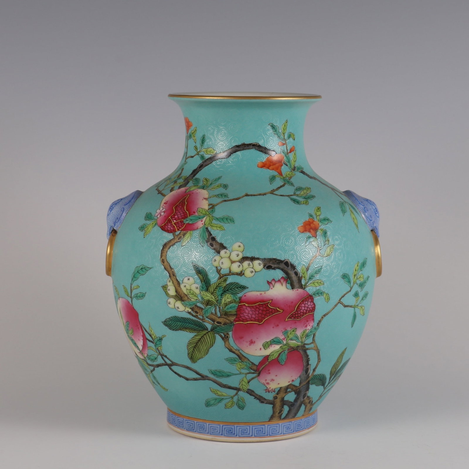 An Exquisite Famille-Rose Green Ground Flower and Fruit Pattern Double-Ears Vase: An Exquisite Famille-Rose Green Ground Flower and Fruit Pattern Double-Ears Vase Qing Dynasty, China Qianlong Six-character Mark