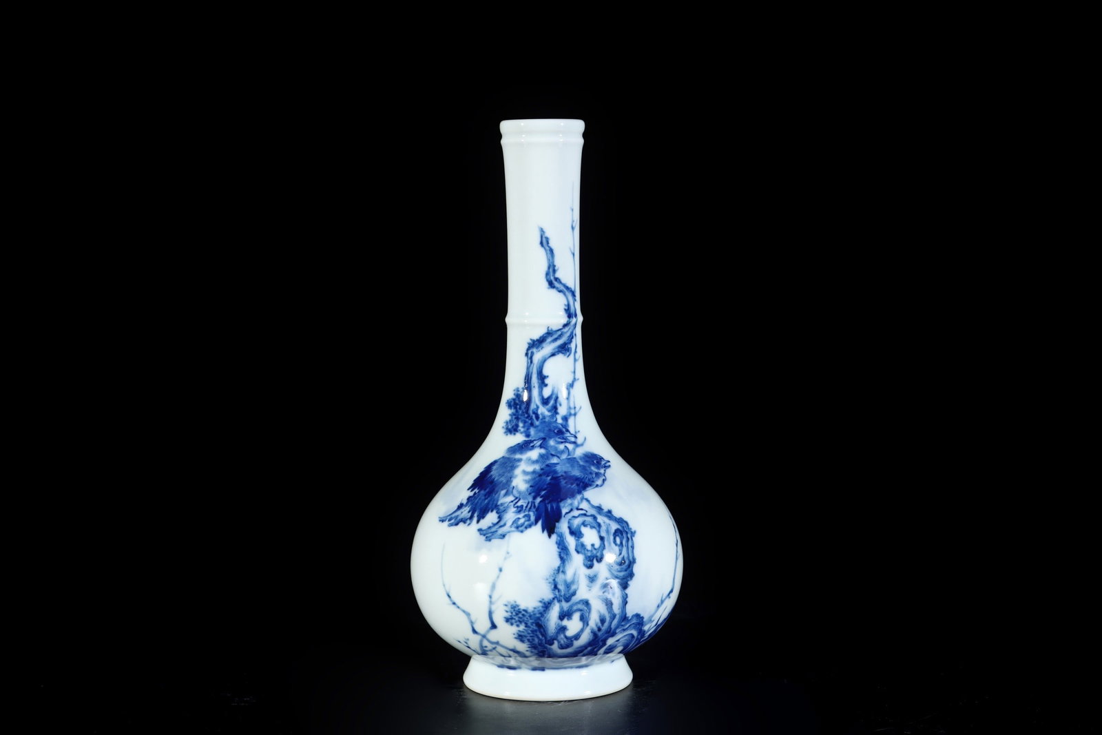 An Exquisite Blue and White Flower and Bird Pattern Vase: An Exquisite Blue and White Flower and Bird Pattern Vase Qing Dynasty, China Size:9.1inx4.3in青花寒鸦枯枝图胆瓶 中国清代