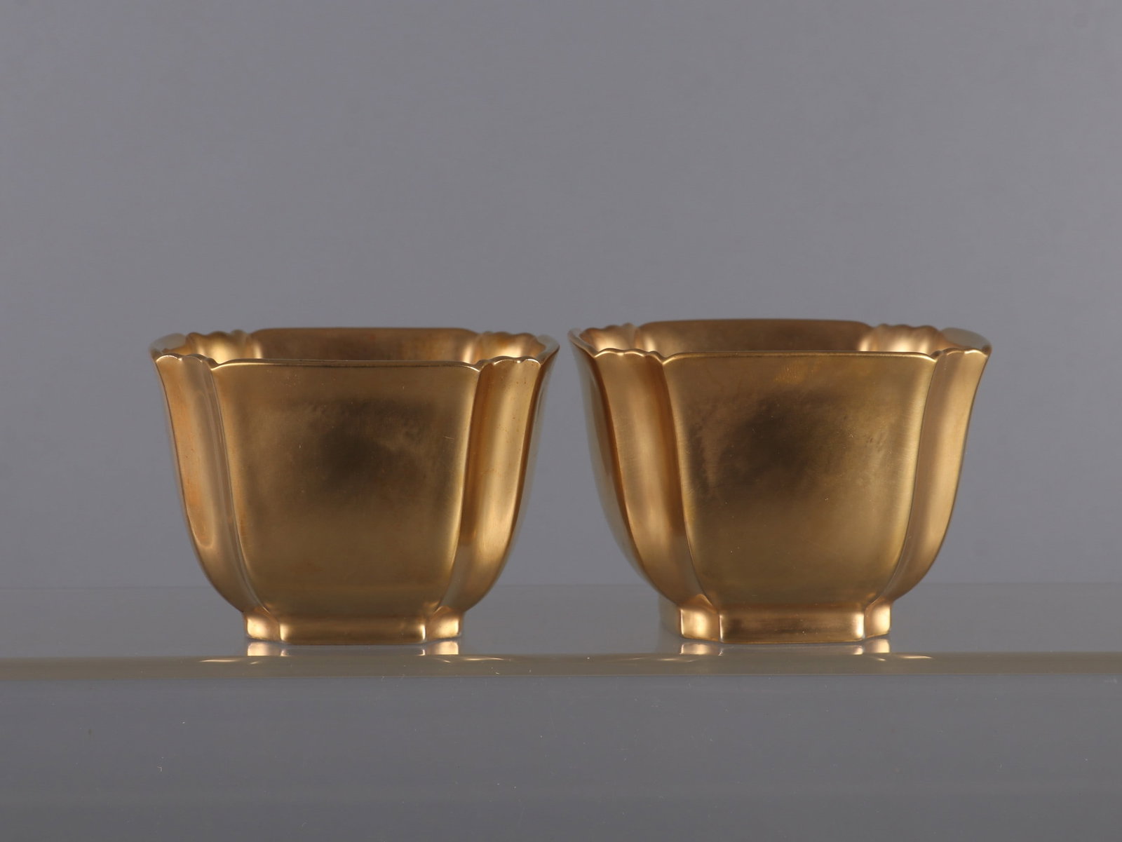 A Pair of Exquisite Gilt glaze Cup: A Pair of Exquisite Gilt glaze Cup Qing Dynasty, China Qianlong Six-character Mark Size:2.2inx3in鎏金四方缸杯一对 中国清代