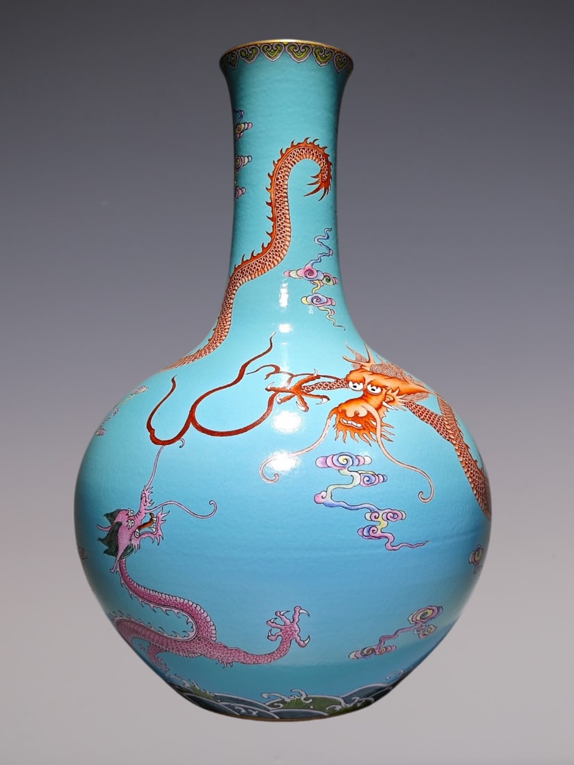 An Exquisite Famille-Rose Dragon Pattern Seawater Pattern Vase: An Exquisite Famille-Rose Dragon Pattern Seawater Pattern Vase Qing Dynasty, China Qianlong Six-character Mark
