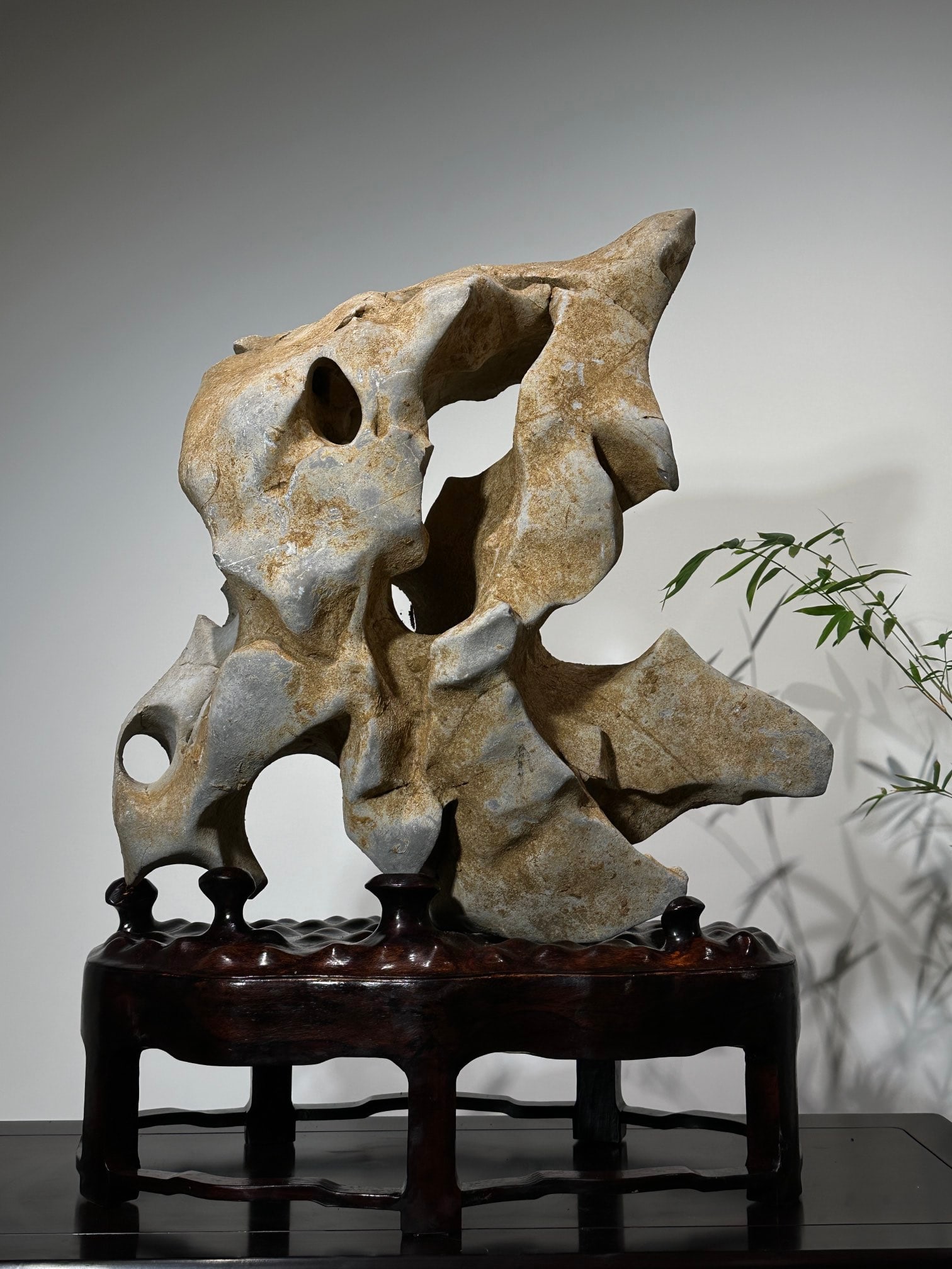 An Exquisite Taihu Stone Ornament: An Exquisite Taihu Stone Ornament Qing Dynasty, China Size:30.7inx23.6inx11.8in太湖石白玉玲珑摆件 中国清代 Size:78cmx60cmx