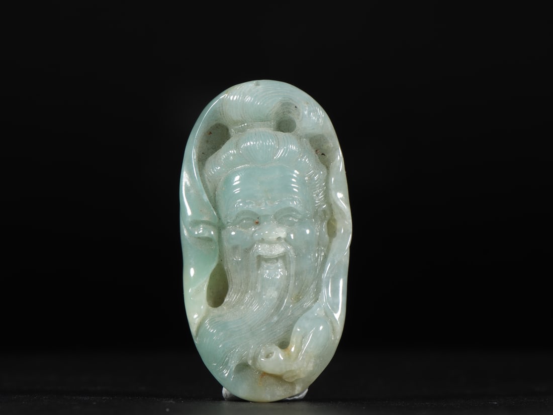 An Exquisite Jadeite Figure Pattern Pendant: An Exquisite Jadeite Figure Pattern Pendant Qing Dynasty, China Size:2.1inx1.1inx0.5in Weight:33g翡翠挂佩 中国清代 Size:5.4cmx2.9cmx1.3cm Weight:33g