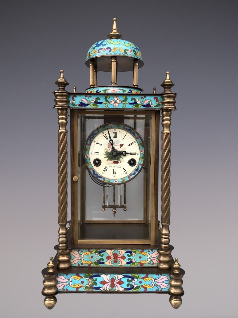 An Exquisite Bronze Lotus Pattern Clock: An Exquisite Bronze Lotus Pattern Clock Qing Dynasty, China Size:21.7inx8.7inx9.8in铜缠枝莲纹钟表 中国清代 Size:55cmx22cmx25cm