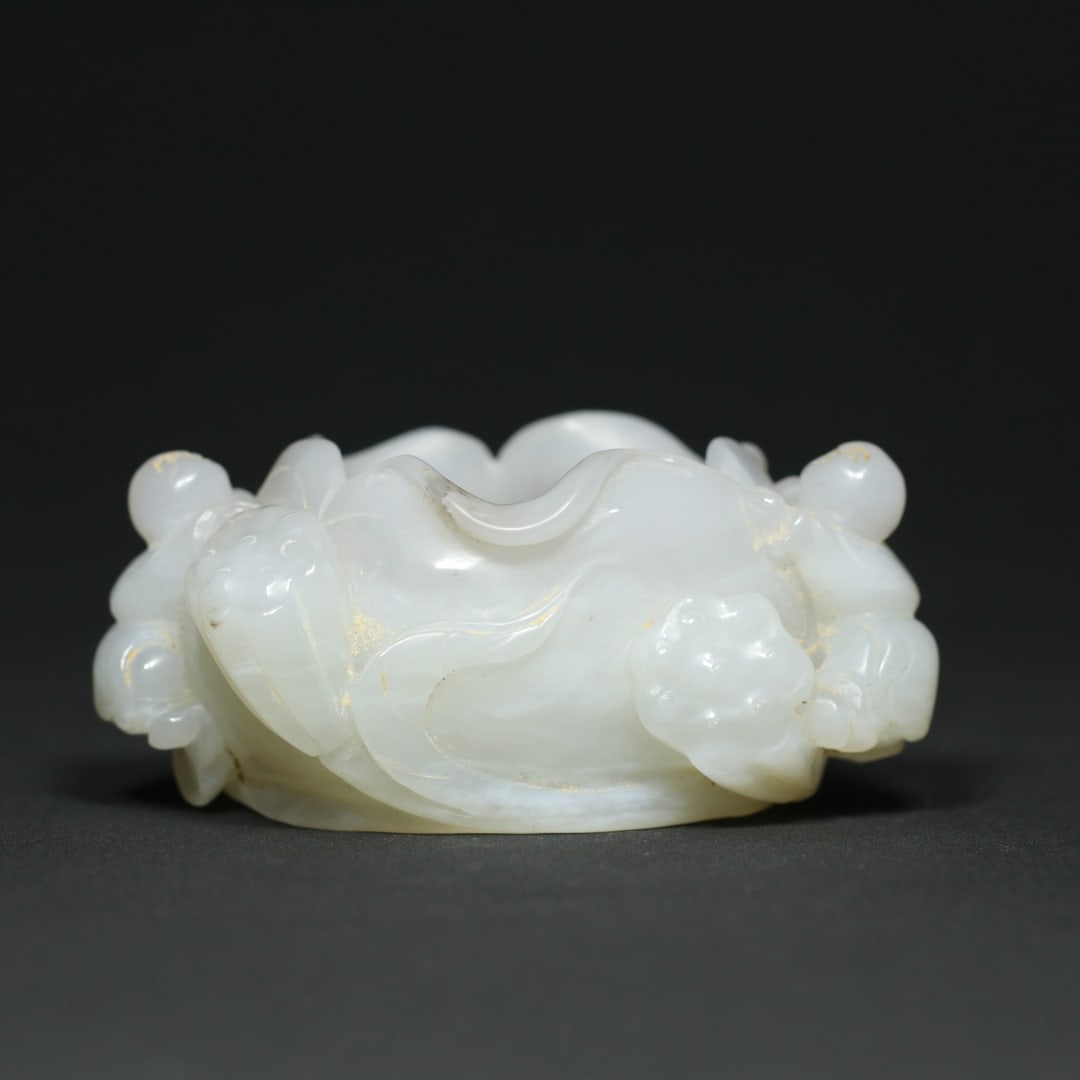 An Exquisite White Jade Figure Pattern Lotus Leaf-Shaped Brush Washer Ornament: An Exquisite White Jade Figure Pattern Lotus Leaf-Shaped Brush Washer Ornament Qing Dynasty, China Size:3.3inx2.6inx1.5in