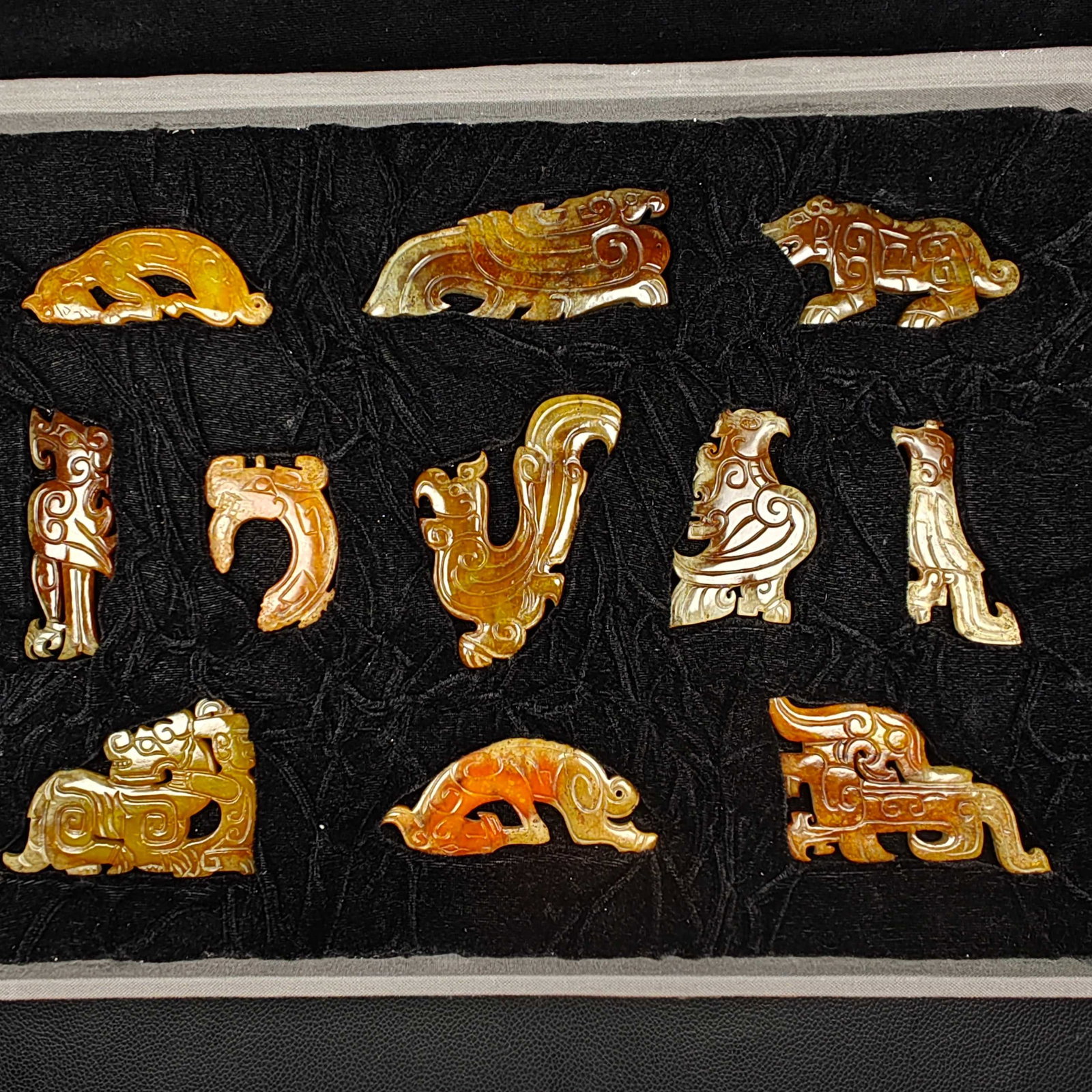 A Set of Fine White Jade With Inscription Auspicious Beast Ornament: A Set of Fine White Jade With Inscription Auspicious Beast Ornament Han Dynasty, China Size:2.6inx1.4in Size:4.3inx2.6in Weight:540g白玉佩一套 中国汉