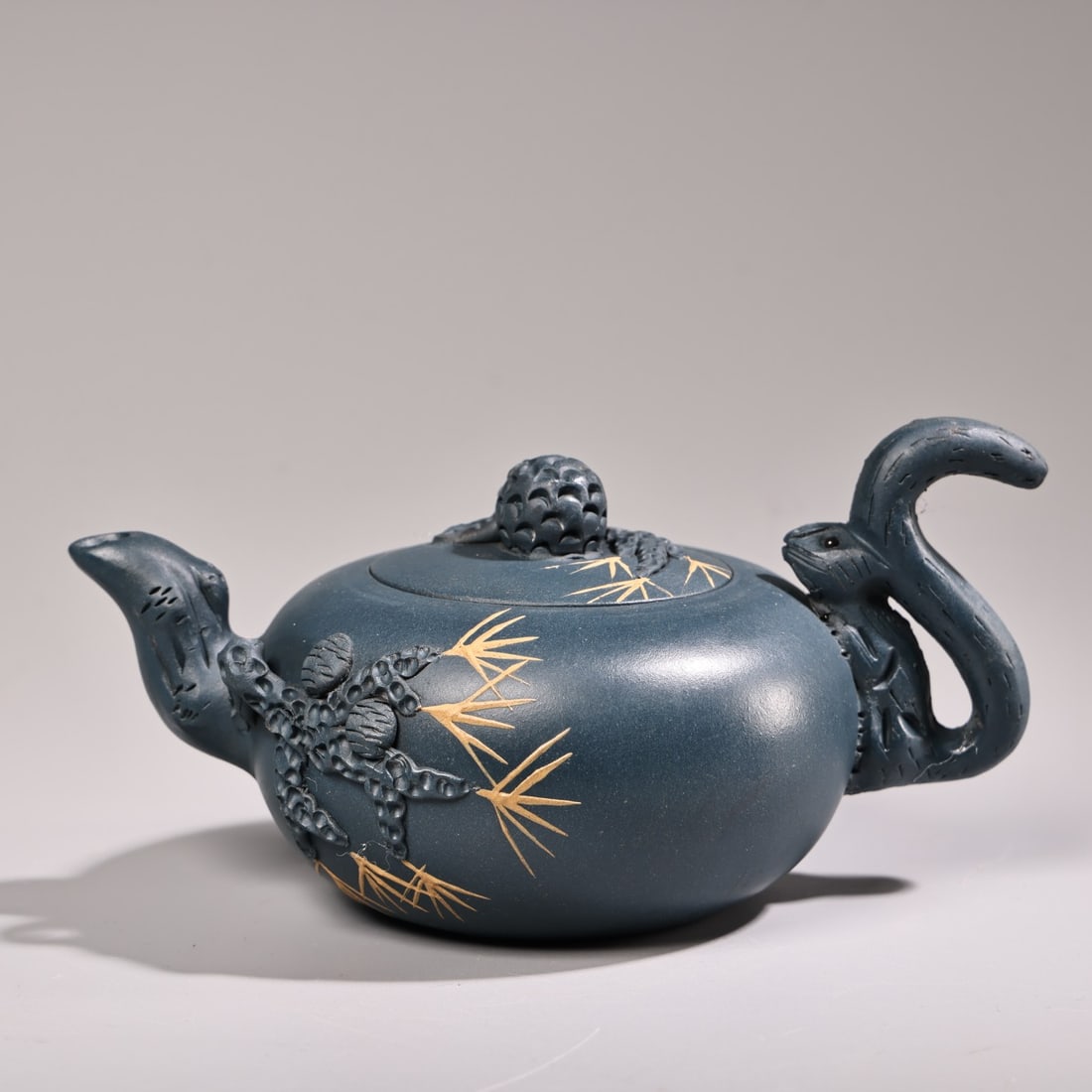 An Exquisite Purple Sands Bamboo Pattern Teapot: An Exquisite Purple Sands Bamboo Pattern Teapot Qing Dynasty, China Size:3.1inx6.3in Weight:240g紫砂壶一把 中国清代 Size:8cmx16cm Weight:240g