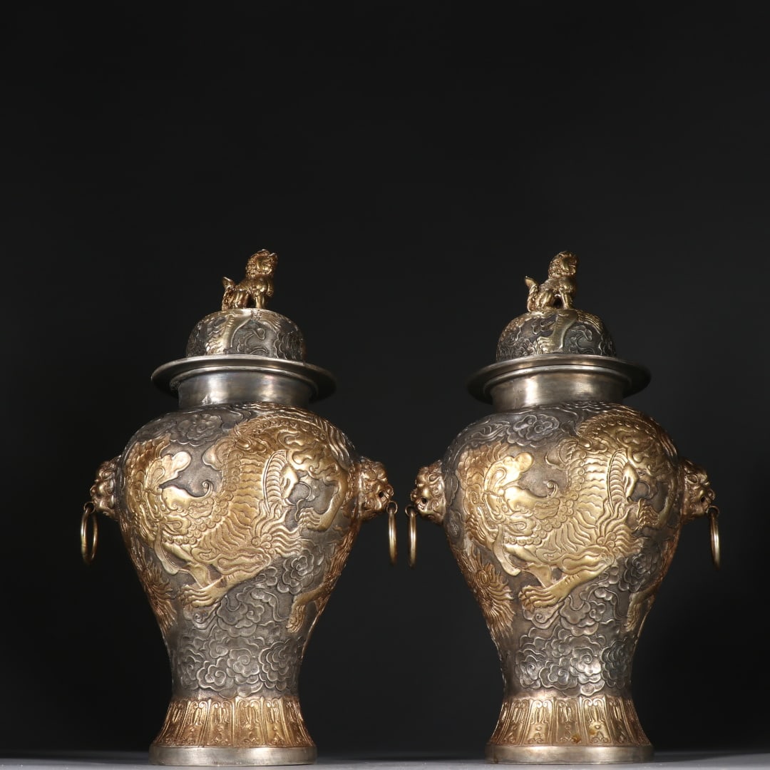 A Pair of Exquisite Gilt Bronze and Silver Lion Pattern Double-Ears Vase: A Pair of Exquisite Gilt Bronze and Silver Lion Pattern Double-Ears Vase Qing Dynasty, China Qianlong Four-character Mark Size:10.5inx6.3in Weight:1432.2g铜鎏金鎏银ࡡ