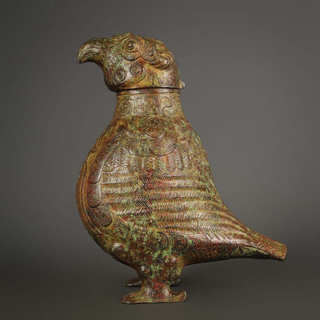 An Exquisite Bronze Bird-Shaped Censer: An Exquisite Bronze Bird-Shaped Censer W.Zhou , China Size:9.4inx13.4in Weight:3300g青铜鸟尊 西周时期 Size:24cmx34cm Weight:3300g