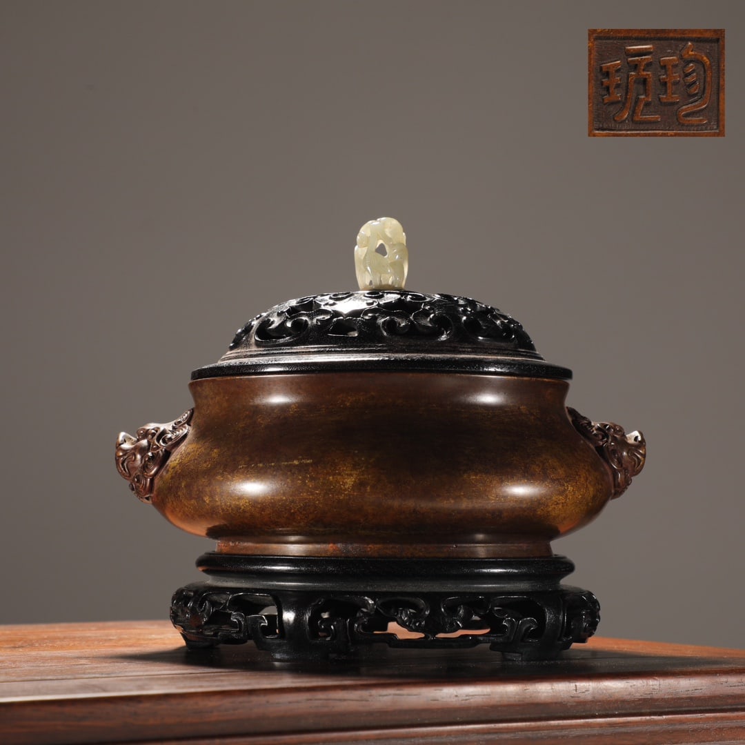 An Exquisite Bronze Double-Ears Censer: An Exquisite Bronze Double-Ears Censer Ming Dynasty, China Size:6.3inx6.3in Weight:1600g铜狮首耳炉 中国明代 Size:16cmx16cm Weight:1600g