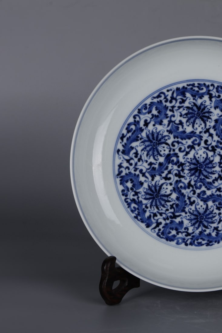 An Exquisite Blue and White Lotus Pattern Plate: An Exquisite Blue and White Lotus Pattern Plate Qing Dynasty, China Yongzheng Six-character Mark Size:1.7inx8.2in青花缠枝花卉纹盘