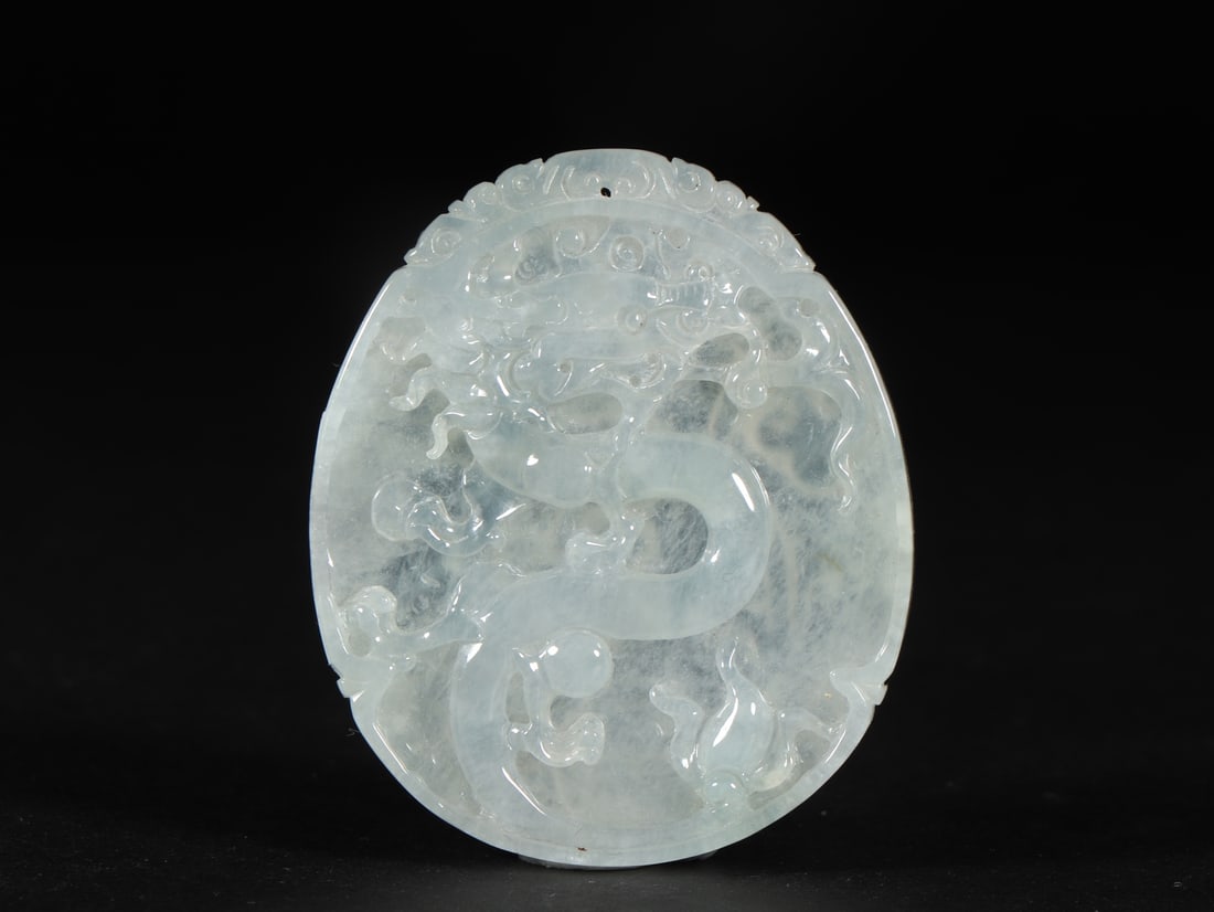 An Exquisite Jadeite Dragon Pattern Pendant: An Exquisite Jadeite Dragon Pattern Pendant Qing Dynasty, China Size:2.2inx1.9inx0.3in Weight:34g翡翠挂佩 中国清代 Size:5.6cmx4.7cmx0.8cm Weight:34g