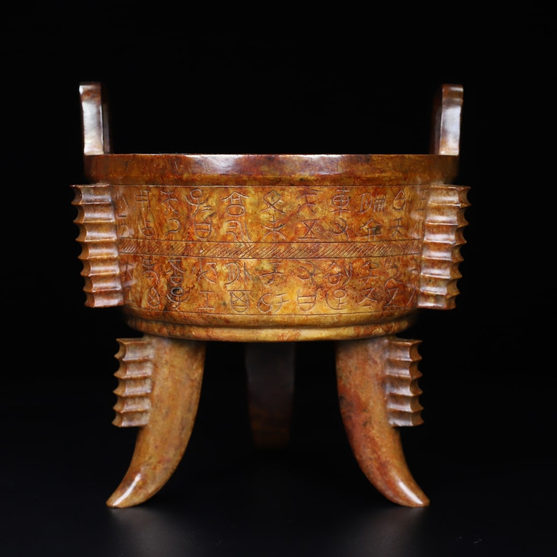 An Exquisite White Jade With Inscription Double-Ears and Tripod Censer: An Exquisite White Jade With Inscription Double-Ears and Tripod Censer Han Dynasty, China Size:7.2inx6.8inx6.7in Weight:1.477kg白玉满铭文三足炉