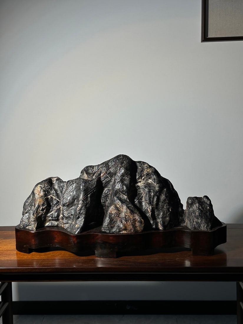 An Exquisite Lingbi Stone Rockery Ornament: An Exquisite Lingbi Stone Rockery Ornament Qing Dynasty, China Size:29.1inx12.6inx11.8in灵璧石山型摆件 中国清代 Size:74cmx32cmx30cm