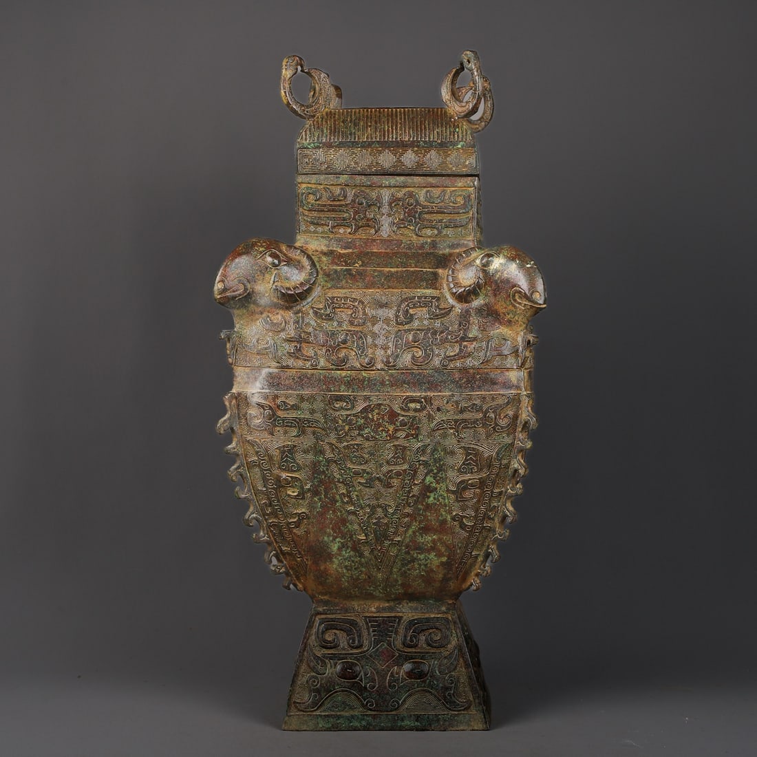 An Exquisite Bronze Beast-Face Pattern Vase: An Exquisite Bronze Beast-Face Pattern Vase W.Zhou , China Size:9.4inx20.1in Weight:9050g青铜四羊方罍 西周时期 Size:24cmx51cm Weight:9050g