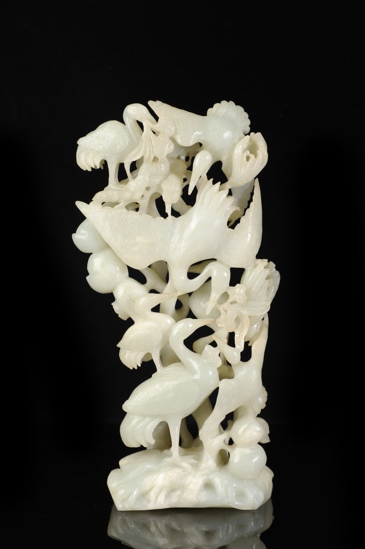An Exquisite White Jade Flower and Bird Pattern Ornament: An Exquisite White Jade Flower and Bird Pattern Ornament Qing Dynasty, China Size:11.8inx6.3inx2.8in Weight:2kg白玉花鸟纹摆件