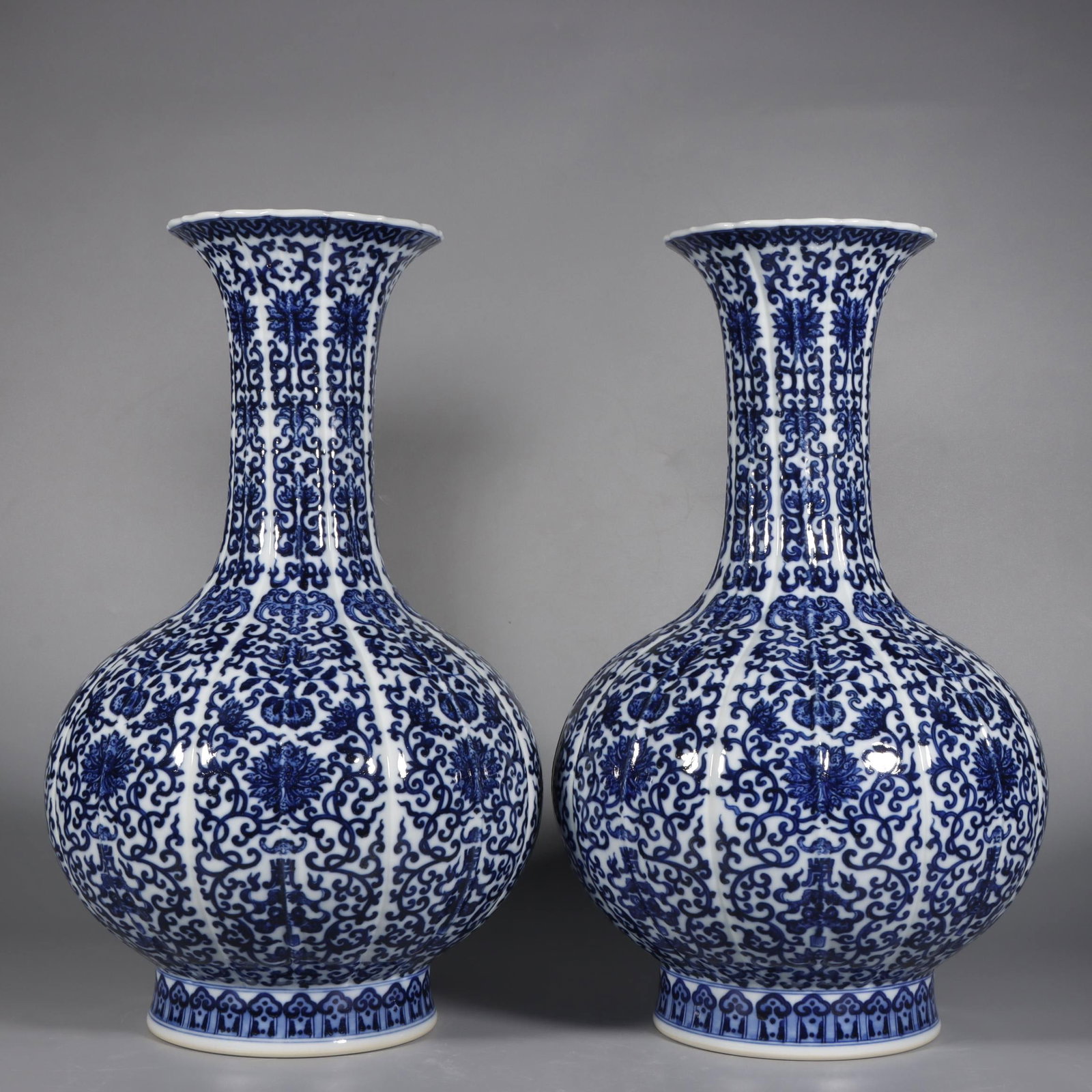 An Exquisite Blue and White Lotus Pattern Bats and Peach Pattern Vase: An Exquisite Blue and White Lotus Pattern Bats and Peach Pattern Vase Qing Dynasty, China Qianlong Six-character Mark Size:16.1inx9.8in青花缠枝莲纹福寿&