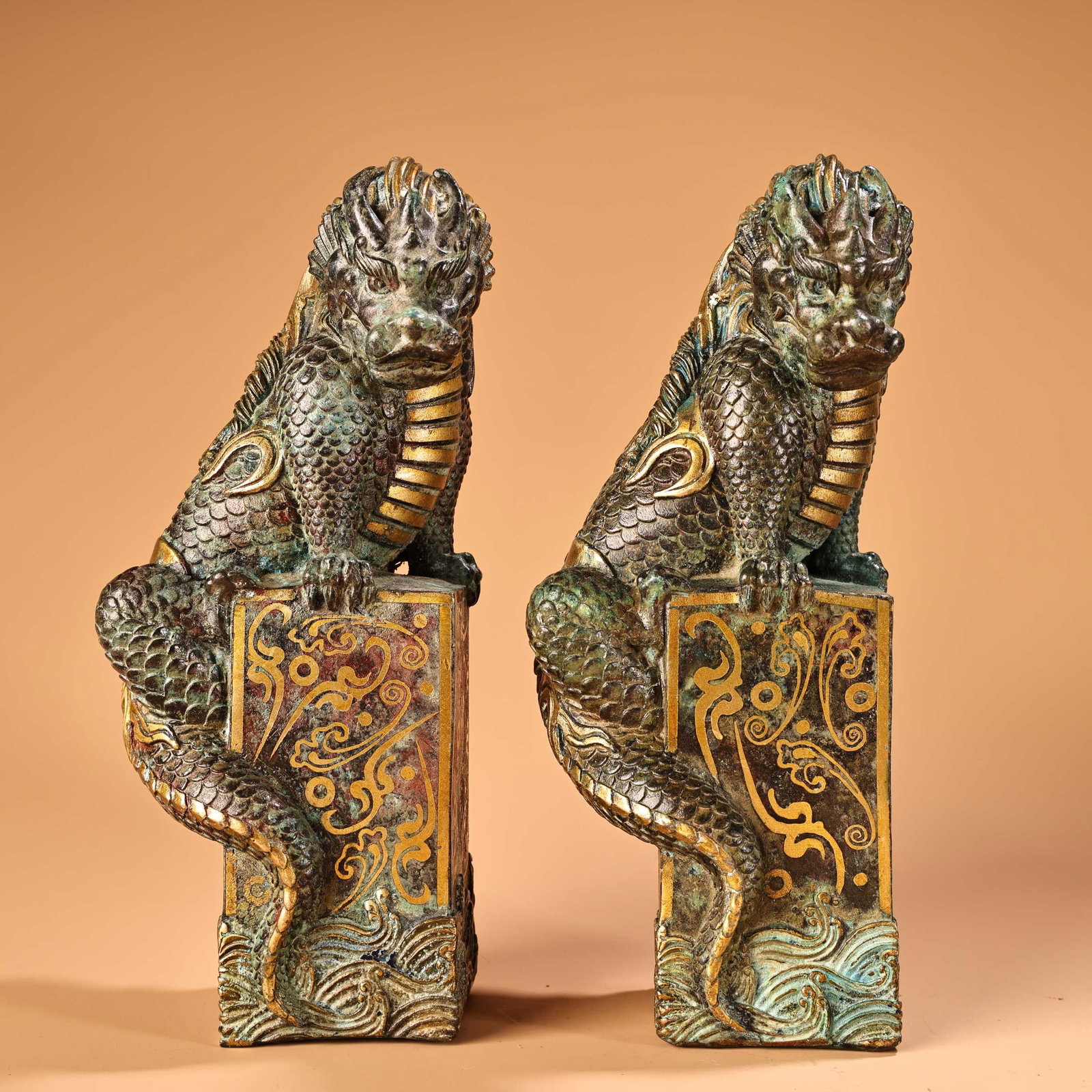 A Pair of Exquisite Bronze Inlaid Silver Auspicious Beast Ornament: A Pair of Exquisite Bronze Inlaid Silver Auspicious Beast Ornament Han Dynasty, China Size:7.9inx3.1in Weight:1400g青铜错金吸水兽一对