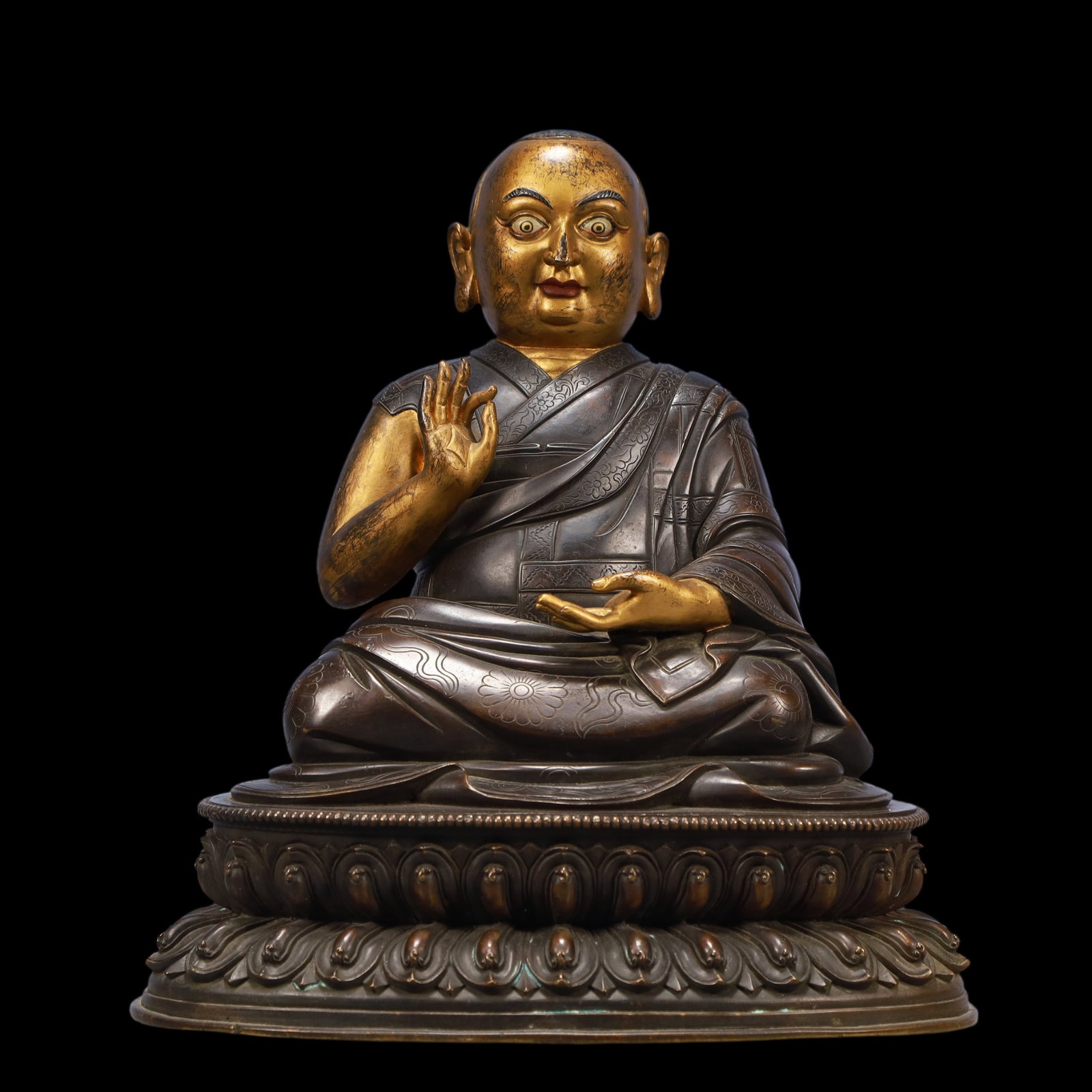 A Exquisite Gilt Bronze Statue of Guru: A Exquisite Gilt Bronze Statue of Guru Ming Dynasty, China Size:10.6inx7.9inx11in Weight:6100g铜鎏金上师 中国明代 Size:27cmx20cmx28cm Weight:6100g