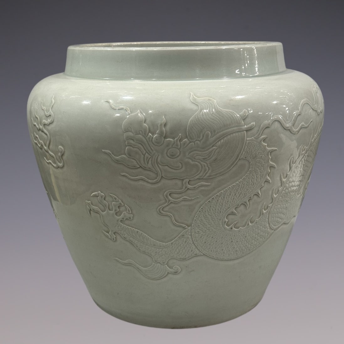 An Exquisite Shufu Glazed Dragon Pattern Vat: An Exquisite Shufu Glazed Dragon Pattern Vat Yuan Dynasty, China Size:15.4inx12.4in枢窑卵白釉堆雕龙纹缸 中国元代