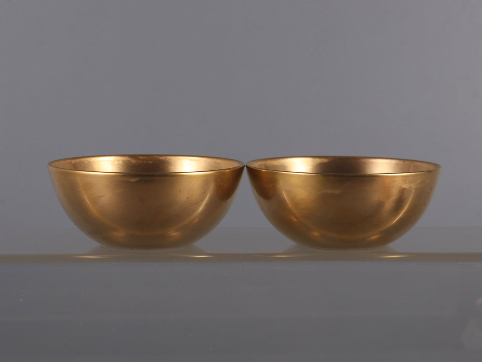 A Pair of Exquisite Gilt glaze Cup: A Pair of Exquisite Gilt glaze Cup Qing Dynasty, China Yongzheng Six-character Mark Size:1.4inx3.4in鎏金卧足杯一对 中国清代