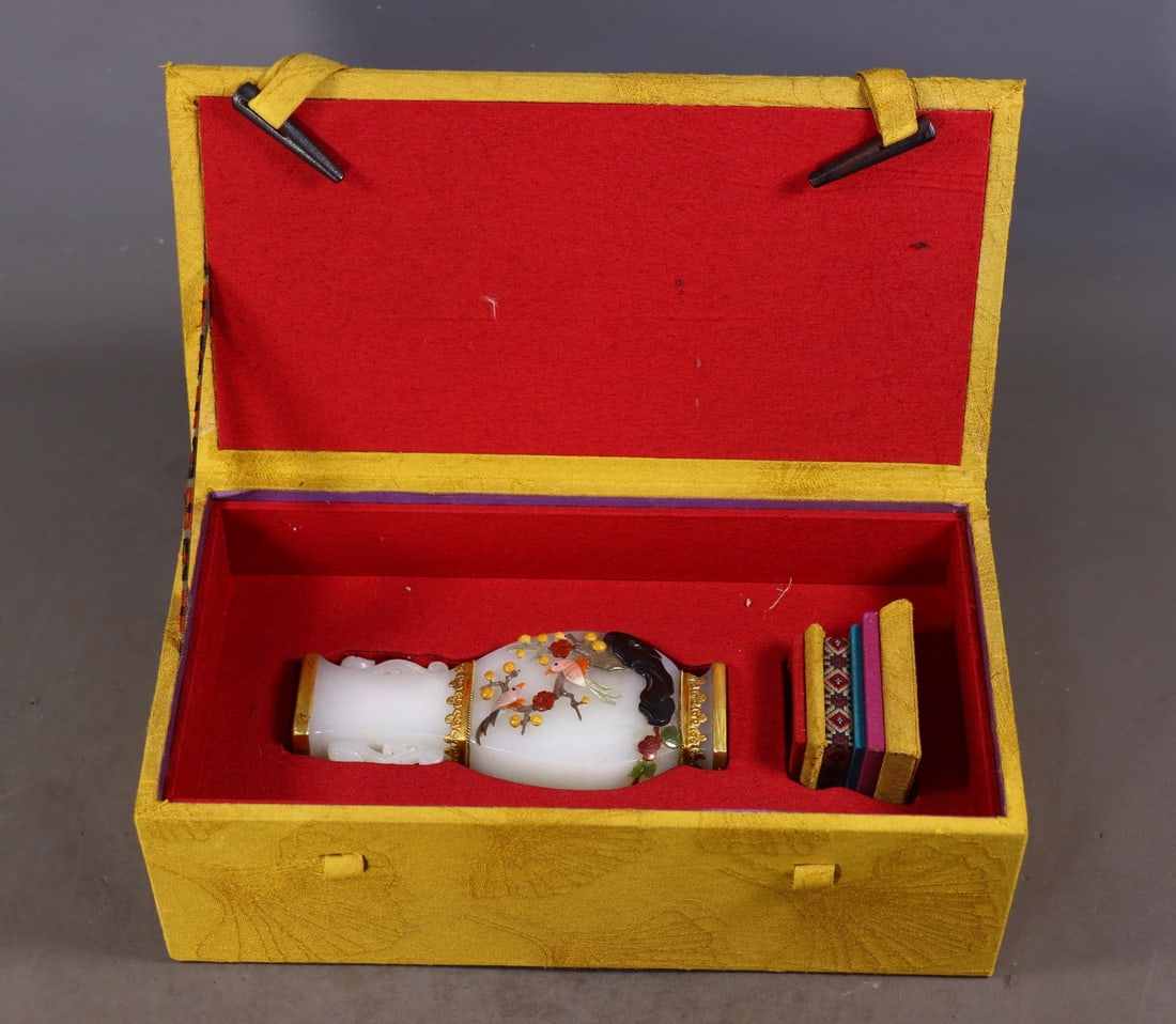 An Exquisite White Jade Inlaid Gems Flower and Bird Pattern Double-Ears Vase: An Exquisite White Jade Inlaid Gems Flower and Bird Pattern Double-Ears Vase Qing Dynasty, China Size: 5.5inx2.2inx1.2in