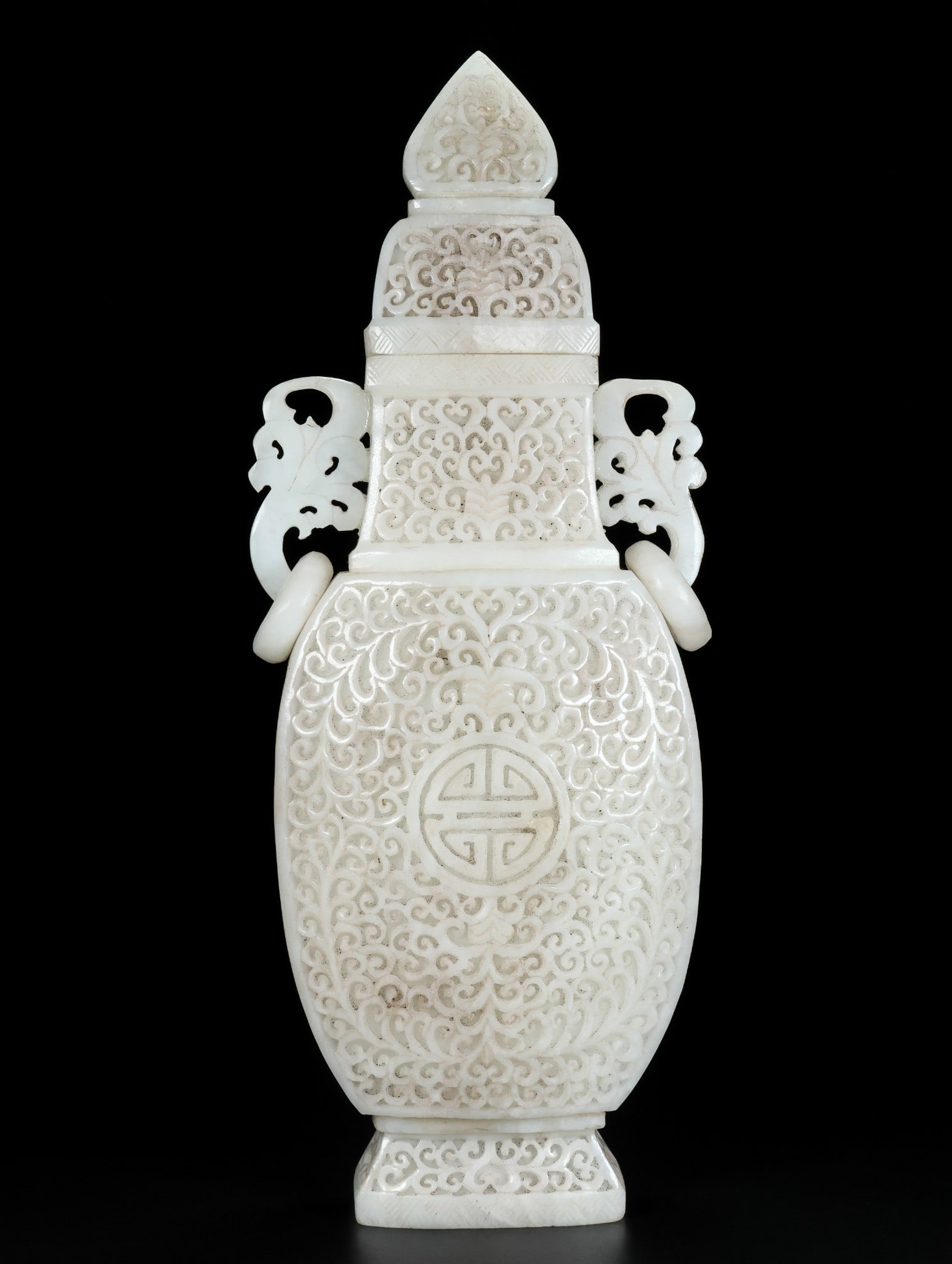An Exquisite White Jade Lotus Pattern Double-Ears Vase: An Exquisite White Jade Lotus Pattern Double-Ears Vase Qing Dynasty, China Size:12.6inx5.1inx2in Weight:1541g白玉花草双环瓶 中国清代