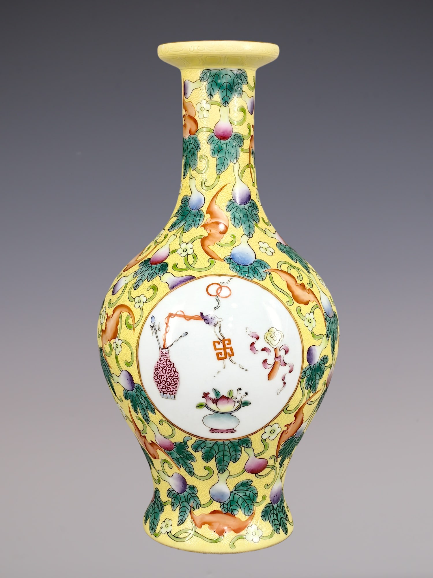 An Exquisite Famille-Rose Bats and Peach Pattern Vase: An Exquisite Famille-Rose Bats and Peach Pattern Vase Qing Dynasty, China Yongzheng Six-character Mark Size:10.6inx5.9in粉彩扒花福寿双全纹鱼