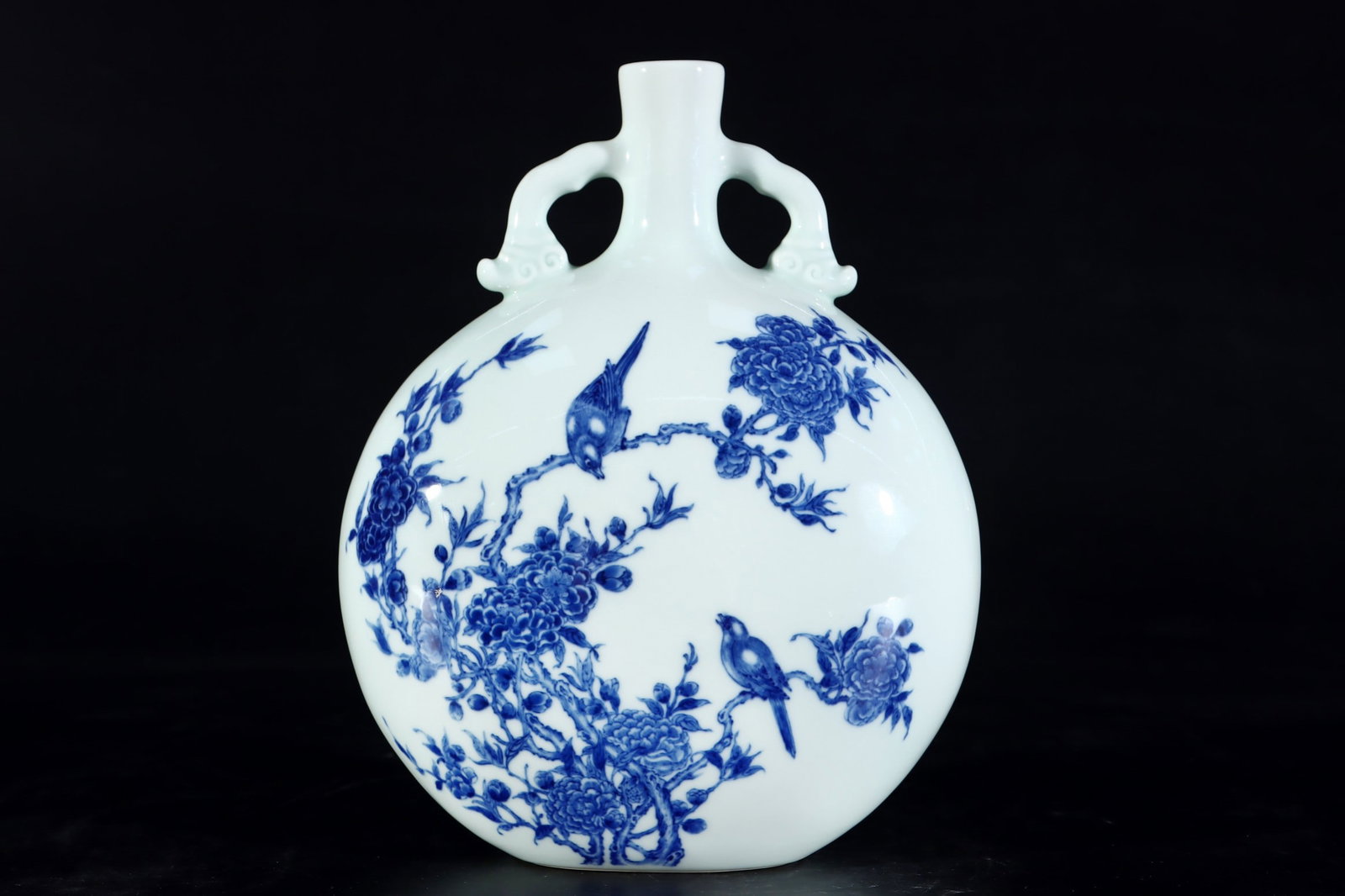 An Exquisite Blue and White Flower and Bird Pattern Double-Ears Vase: An Exquisite Blue and White Flower and Bird Pattern Double-Ears Vase Qing Dynasty, China Yongzheng Six-character Mark Size:9.8inx7.9in青花花鸟纹抱月瓶 &