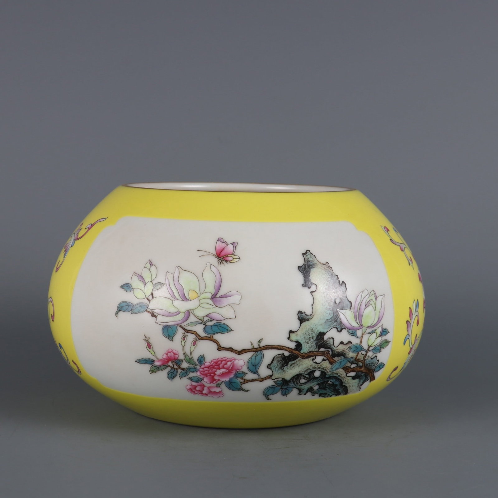 An Exquisite Famille-Rose Yellow Glazed Flower and Butterfly Pattern Brush Washer: An Exquisite Famille-Rose Yellow Glazed Flower and Butterfly Pattern Brush Washer Qing Dynasty, China Qianlong Six-character Mark