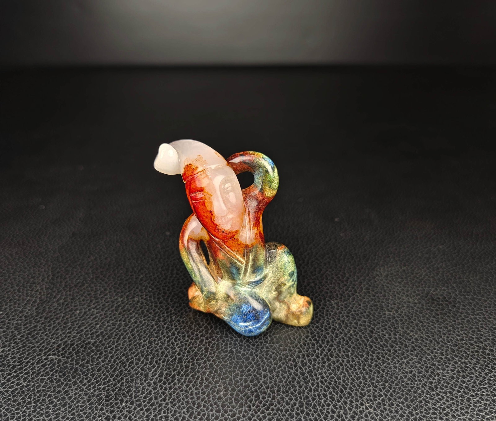 An Exquisite White Jade Figure Ornament: An Exquisite White Jade Figure Ornament Han Dynasty, China Size:2.8inx2in Weight:75g白玉舞人 中国汉代 Size:7cmx5cm Weight:75g