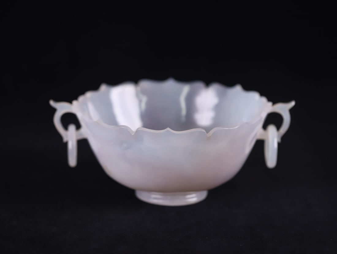 An Exquisite Agate Double-Ears Bowl: An Exquisite Agate Double-Ears Bowl Qing Dynasty, China Size:3.8inx6.9in Weight:661g玛瑙花口活环碗 中国清代 Size:9.7cmx17.5cm